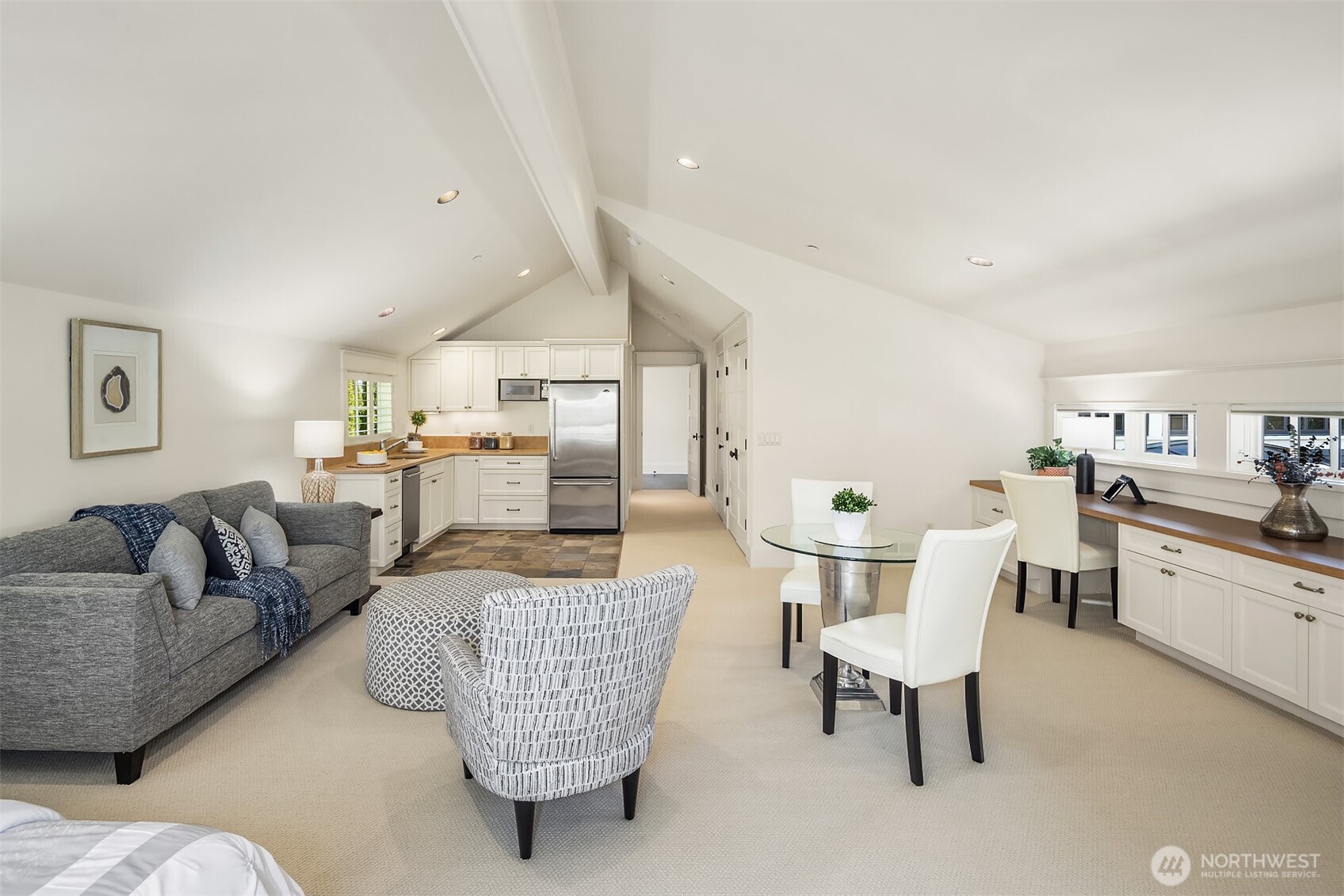 Tucked away in its own wing, this fabulous space is spacious enough for a huge in-home office offering ample room for meetings, creative sessions or a full professional set up.