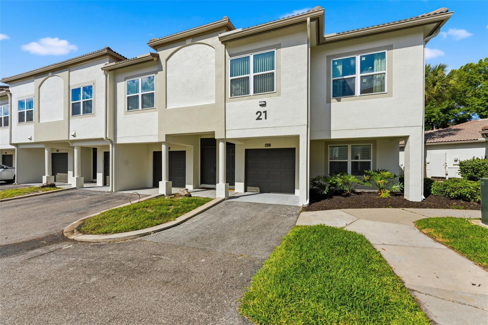 Desirable 24-HOUR GUARD-GATED COMMUNITY of Island Walk on exclusive waterfront HARBOUR ISLAND. One of the most WALKABLE NEIGHBORHOODS in the heart of DOWNTOWN TAMPA.This beautiful TOWNHOME-STYLE CONDO offers 2 BEDROOMS, 2 BATHROOMS, and a PRIVATE 1-CAR GARAGE, all designed for TURNKEY LIVING. Immediate occupancy available. Nestled among the trees, the setting offers a rare sense of SERENITY while still being right in the middle of everything.Second-floor living all on one level with an open-concept floor plan that has been FULLY UPDATED so you don’t have to lift a finger. Wood-look tile flooring runs throughout, paired with fresh interior paint and smooth level 5 drywall ceilings. The kitchen is a standout with QUARTZ WATERFALL COUNTERTOPS, CALACATTA FINISHES, a new hood, and newer appliances.Additional upgrades include BRAND NEW WINDOWS throughout, French door shutters, updated bathroom vanities, a custom primary closet, new bannisters, and a 2024 AC, giving you both style and peace of mind.The exterior has just completed a NEW MODERN STUCCO AND PAINT REFRESH, making the building feel brand new.Amenities for your enjoyment include RESORT-STYLE POOLS, hot tub, lighted tennis courts, a STATE-OF-THE-ART FITNESS CENTER, playground, and clubhouse. The HOA also covers water, sewer, concierge trash pickup, pest control, building insurance, and maintenance of the grounds, creating a truly LOW-MAINTENANCE LIFESTYLE.Prime location just steps from everything Tampa has to offer. Walk to the RIVERWALK, SPARKMAN WHARF, WATER STREET, AMALIE ARENA, Tampa General Hospital, USF Medical, and some of the city’s best dining. Quick access to Tampa International Airport. Convenient guest parking just steps away. Pet friendly. Safe.Enjoy the perfect balance of SERENITY and the ENERGY OF DOWNTOWN TAMPA LIVING.SCHEDULE YOUR PRIVATE SHOWING TODAY