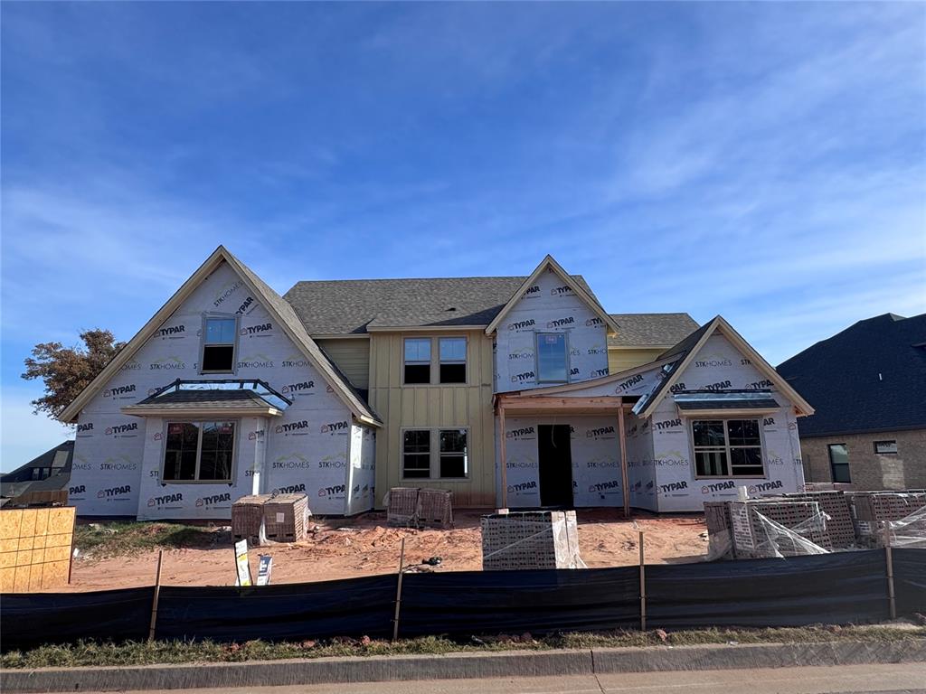 Welcome to the spacious and luxurious Scissortail floor plan, a stunning 3647-square-foot residence that seamlessly blends comfort and sophistication. Boasting 5 bedrooms, 3 bathrooms, a study, and a loft, this home is thoughtfully designed to meet the needs of a modern lifestyle. The 3-car split garage with a side load provides ample space for vehicles and storage. Upon entering, you are greeted by a grand foyer that leads to a captivating staircase, setting the tone for the home’s elegance. The primary bedroom suite features separate sinks and a standalone tub, creating a serene retreat. Three additional bedrooms and a well-appointed bathroom are conveniently located upstairs, ensuring privacy and space for everyone. The heart of the home lies in the expansive kitchen with a large square center island, perfect for both casual meals and entertaining guests. The open layout flows seamlessly into the living spaces and extends to a long covered back patio, inviting you to enjoy outdoor living in style. Practical elements such as a mud bench at the end of the hallway from the garage entry add functionality to the design, ensuring a seamless transition from the outside world to the comforts of home. With its thoughtful layout and upscale features, the Scissortail floor plan is the epitome of modern living.