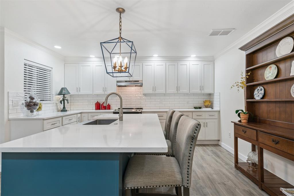 Welcome to refined, effortless living in this spectacular ground-floor residence at The 6000 Penn Condos. Thoughtfully redesigned for elevated entertaining. The fully renovated kitchen showcases all-new cabinetry, sleek quartz countertops, abundant storage, and a dedicated wet bar area—perfect for hosting with ease. The expansive living and dining spaces flow seamlessly together, creating an ideal layout for gatherings large or small. French doors open from the living room to a charming covered patio with generous space for outdoor dining, grilling, and relaxed outdoor living. The primary suite is a true retreat, featuring a spacious bedroom, an oversized closet, dual sinks, and a beautifully appointed bath with a large  shower/tub.  A second private covered patio extends from the primary suite, offering a peaceful outdoor escape. The guest suite is equally inviting, complete with its own dedicated bath.Residents of The 6000 Penn Condos enjoy access to a large swimming pool, abundant green space, and scenic walking trails—all within a fully gated community that offers privacy and tranquility. Ideally positioned between Waterford and Belle Isle, this residence places you moments from The Oak, Nichols Hills Plaza, Classen Curve, and the very best of Oklahoma City’s premier shopping and dining.A rare opportunity to enjoy turnkey, lock-and-leave living in one of the city’s most desirable locations.