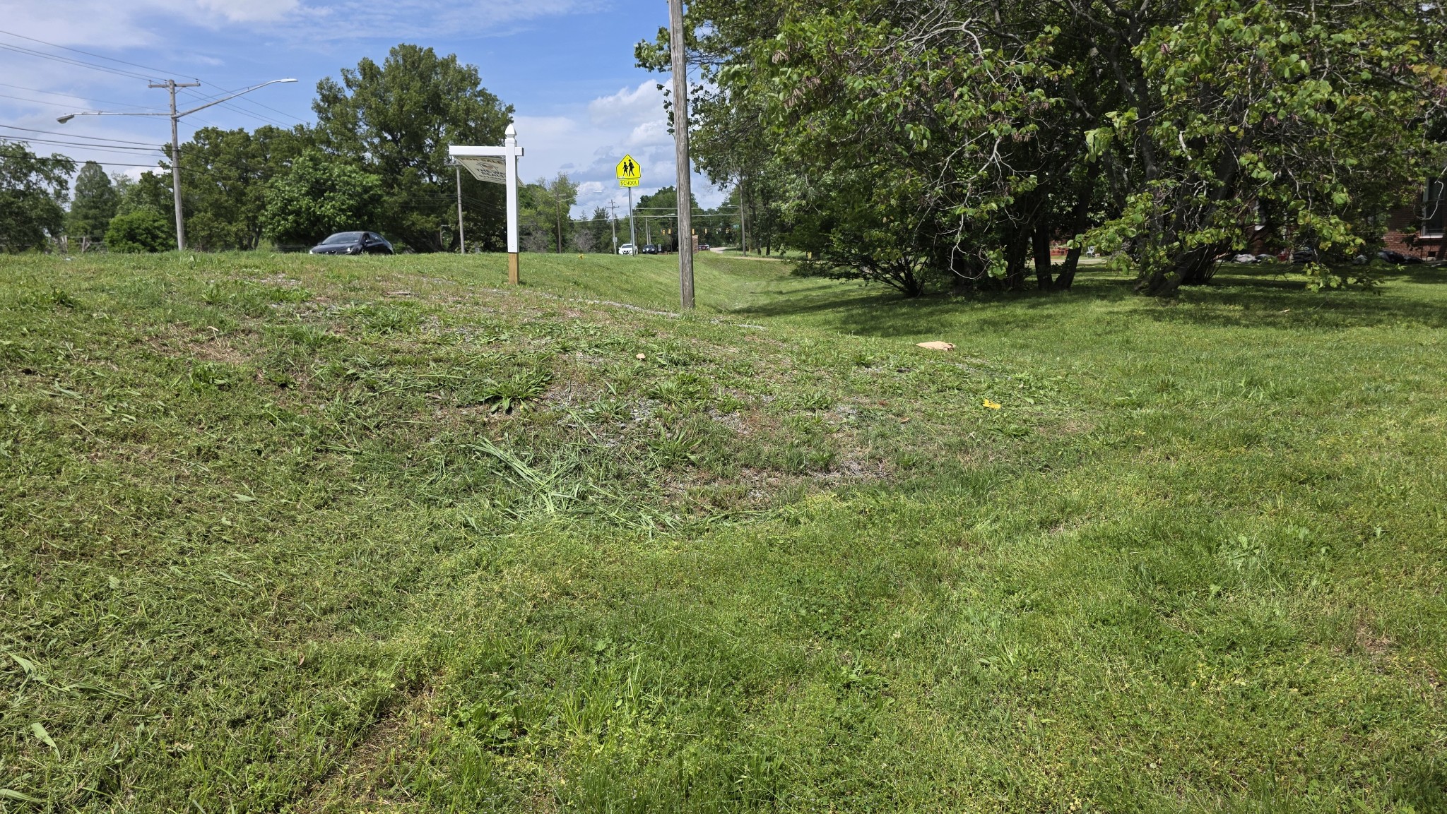 Conveniently located near 3 schools.  With over 130 ft of road frontage, this could be 2 building lots.  The right side drops, so we will need some fill for a second house.   The left side is fine for building a house.  There is a water tap on the property, and the sewer is in the back for easy access.  Very nice area of Columbia
