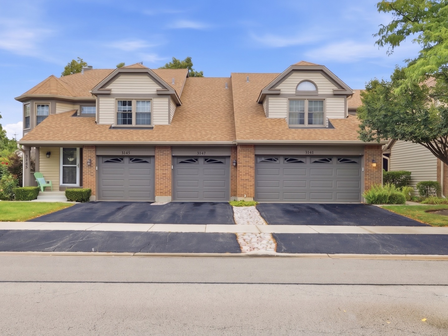 Welcome to this spacious 3-bedroom, 2.5-bath townhome in desirable Frenchman's Cove! This popular open-concept floor plan features beautiful hardwood floors throughout and an abundance of natural light.***The inviting living room offers vaulted ceilings and large windows, creating a bright and airy atmosphere. A convenient first-floor office/den provides the perfect space for working from home, studying, or a flexible-use room. The eat-in kitchen features stainless steel appliances, ample cabinetry, and a convenient service bar. The adjacent dining area opens directly to the patio, making indoor-outdoor entertaining effortless. ***Additional storage is thoughtfully tucked beneath the stairs.***Upstairs, the expansive primary suite offers a private retreat with a walk-in closet and luxurious en-suite bath featuring dual vanities and a jetted soaking tub. Two additional bedrooms, a full hall bath, and convenient second-floor laundry complete the upper level.  ***Enjoy the warmer months relaxing or entertaining on the private patio overlooking a beautifully maintained yard and mature trees. The association maintains the landscaping weekly, allowing you to enjoy a well-kept setting without the upkeep.***Ideally located near shopping, dining, parks, the community center, and highly rated schools. This exceptional townhome offers comfort, space, and convenience in a wonderful Arlington Heights location!