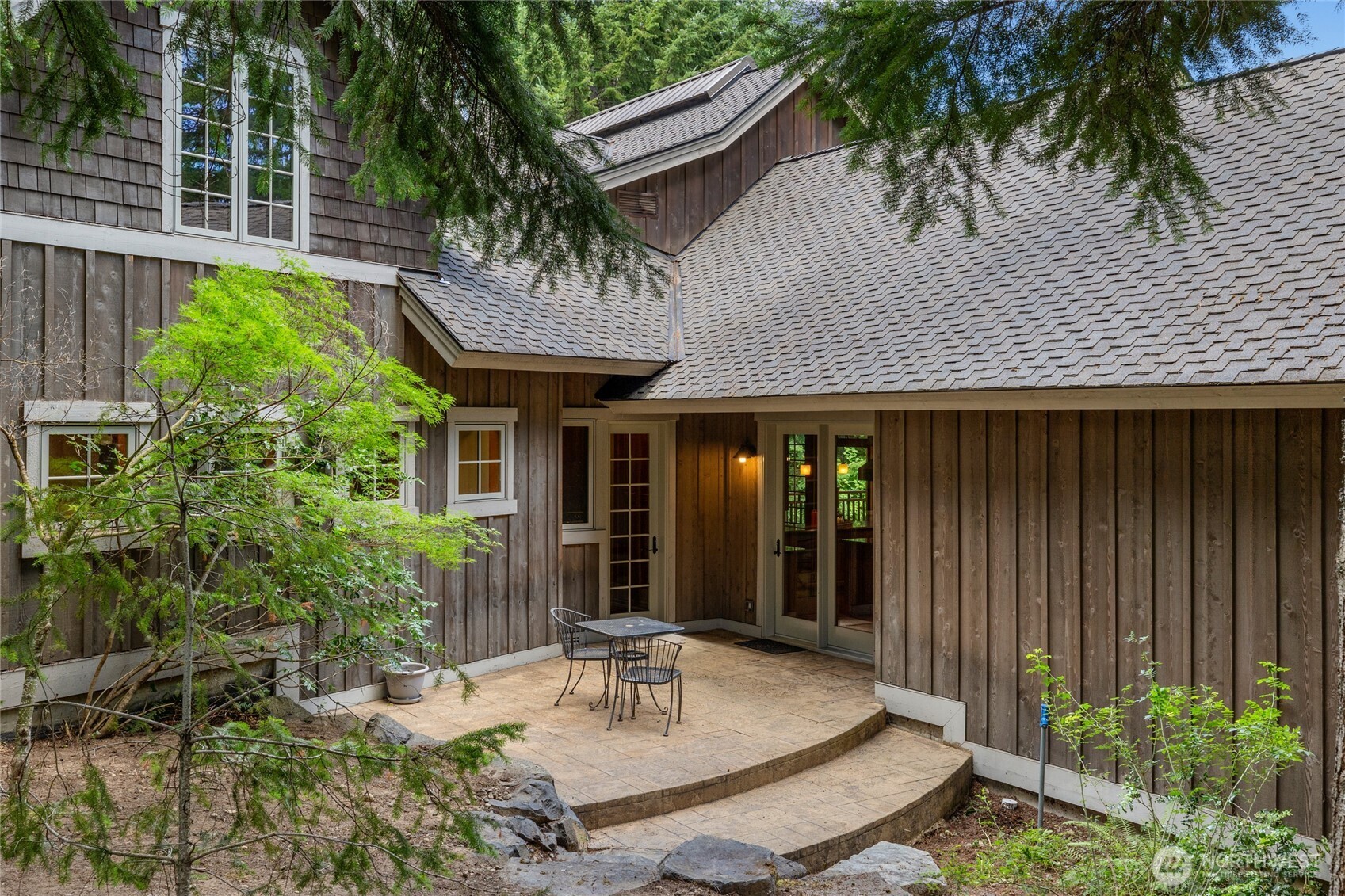 Cute bistro patio to enjoy your morning coffee just off the kitchen and primary bedroom.