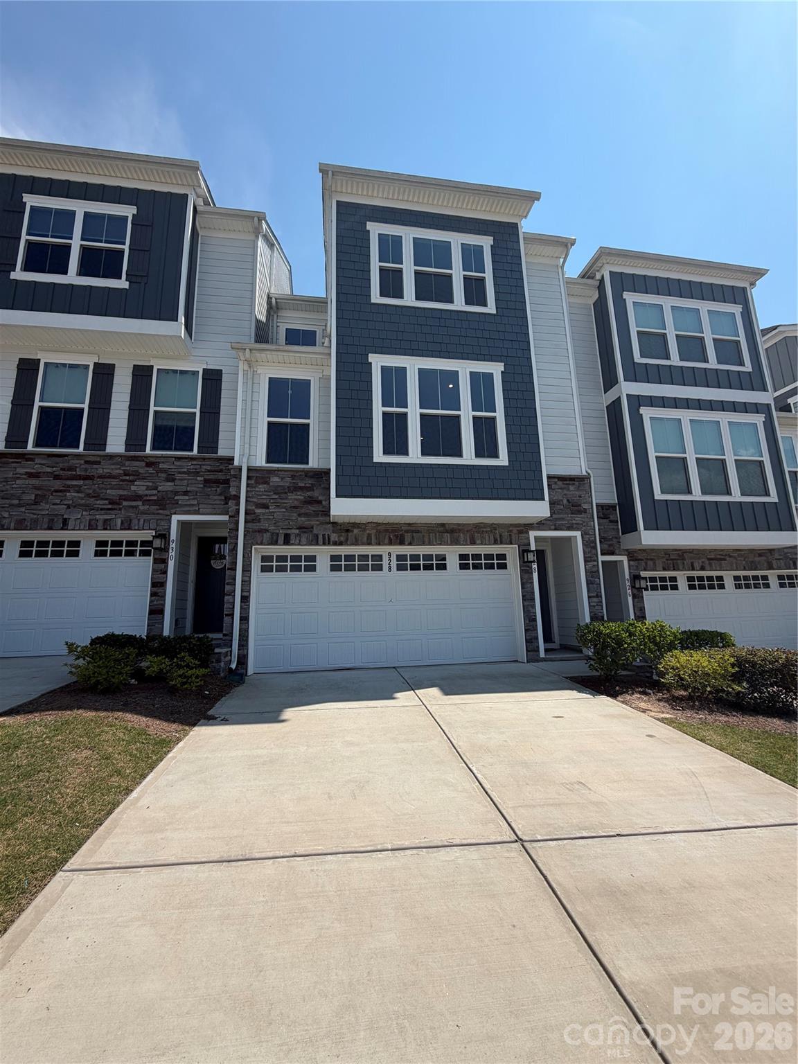 Experience elevated living in this exceptional three-story townhome, perfectly situated in the heart of highly desirable Tega Cay, just minutes from premier shopping, dining, parks, and Lake Wylie. This coveted Serenade floor plan showcases a thoughtfully designed layout with a luxurious primary suite on the upper level and a private lower-level en-suite, ideal for guests, multigenerational living, or a flexible home office.Designed with sophistication in mind, the home features upgraded designer lighting throughout, enhancing its modern elegance and inviting atmosphere. The expansive covered balcony creates the perfect setting for entertaining, outdoor dining, or simply unwinding after a long day. Unlike many townhomes, you’ll also enjoy a generously sized backyard with ample space for gardening, pets, or creating your own private outdoor retreat.Combining upscale finishes, functional living spaces, and an unbeatable location, this move-in-ready home offers the perfect balance of luxury, comfort, and convenience in one of Tega Cay’s most sought-after communities.