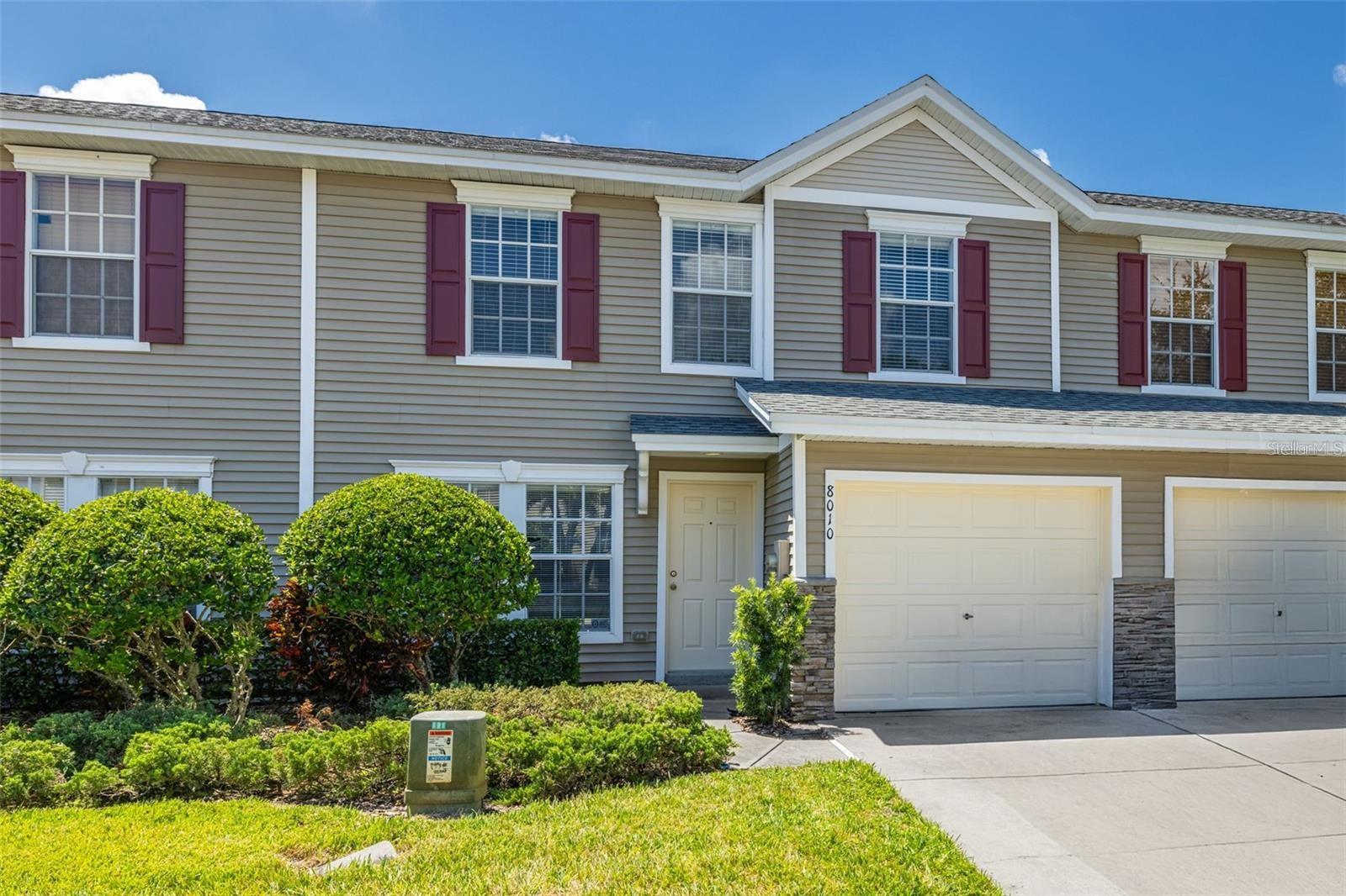 Welcome to this beautiful 2-bedroom, 1.5-bath townhome with a spacious loft in highly desirable Cumberland Trace! Built in 2004, this light-filled home features a smart open floor plan with a large kitchen peninsula and breakfast bar, cathedral ceilings, and versatile loft space—perfect for a home office or guest room. The oversized primary suite offers vaulted ceilings, a walk-in closet, and a spacious ensuite with garden tub, dual sinks, and walk-in shower. Enjoy your private patio, and 1-car garage. The community boasts a pool, pavilion, and low HOA fees—all with no flood insurance required. Conveniently located near shopping, dining, I-275, and the Gulf beaches, this home is move-in ready and waiting for you.