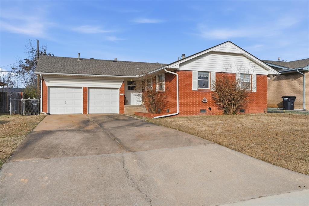 This classic brick home in Moore offers timeless charm, a comfortable layout, and the kind of character that’s hard to find in newer builds. Built in 1961, this 3-bedroom, 1 full bath, 1 half bath home offers original hardwood floors, a thoughtful layout, and the kind of solid construction buyers love in established Moore neighborhoods. Inside, the living room is anchored by a brick fireplace with built-in shelving, creating a cozy focal point and adding timeless appeal. Hardwood floors and large windows bring in natural light, while the layout feels comfortable and functional. The kitchen and dining areas are practical and ready to enjoy, with opportunity to personalize over time. Step outside to a covered back patio that extends your living space and makes outdoor time easy year-round. The fully fenced backyard is level, open, and manageable, ideal for pets, gardening, entertaining, or simply enjoying quiet evenings outdoors without a lot of upkeep. With a true two-car garage including in ground storm shelter, brick exterior, and a layout designed for everyday living, this home is a smart and charming option for buyers looking for a solid house in Moore.