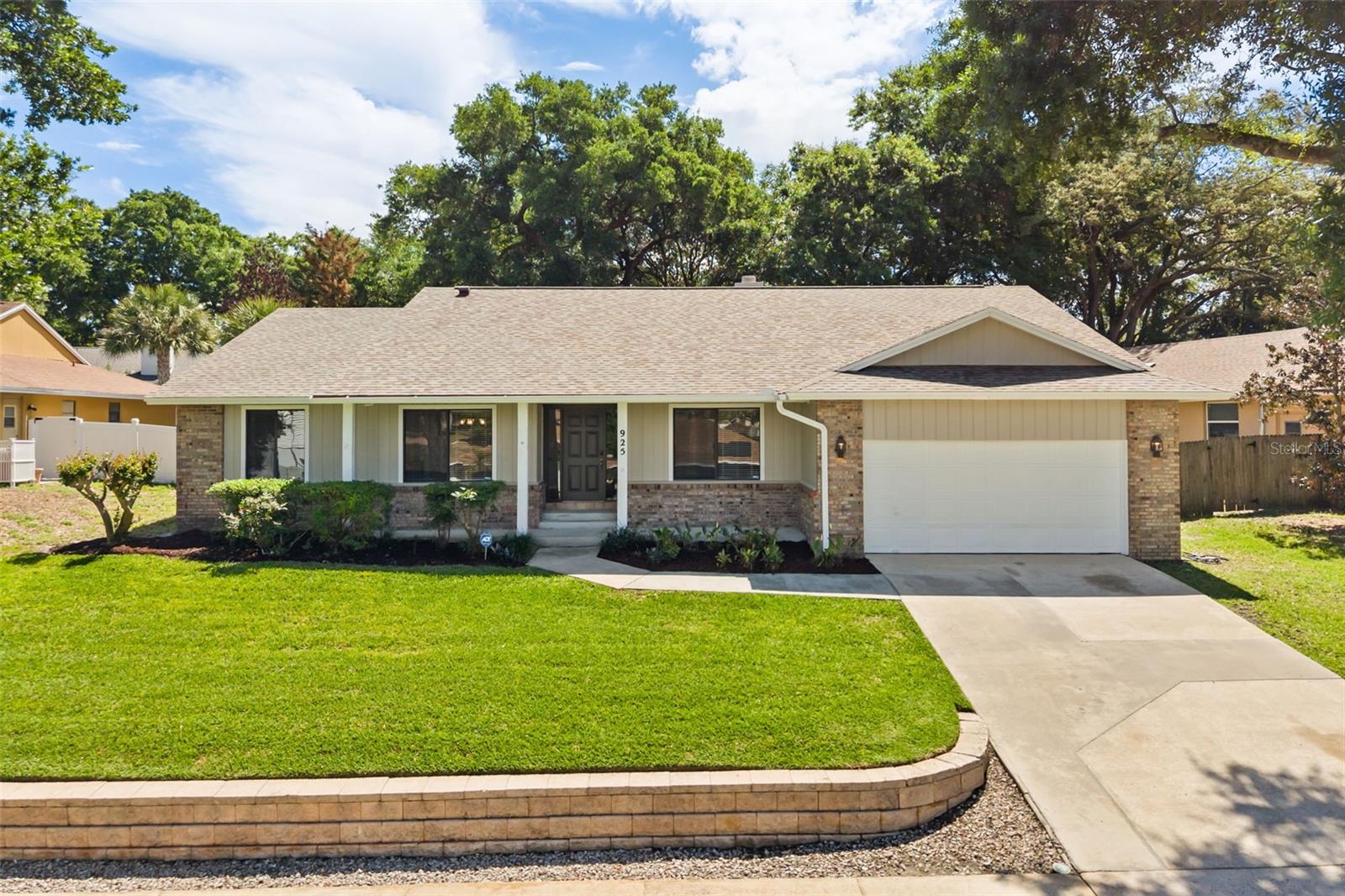 Welcome to 925 Red Dandy Dr in Orlando, a beautifully renovated 3-bedroom, 2-bath home designed with comfort, warmth, and everyday family living in mind. From the moment you step inside, you are greeted by bright, inviting spaces and a layout that makes it easy to feel right at home.The updated kitchen serves as the heart of the home, offering a clean, modern feel while still being a place where meals, conversations, and memories come together. The remodeled bathrooms and newer laminate flooring add a fresh, stylish touch, while also providing the durability families need for day-to-day life. The thoughtful layout offers comfortable bedrooms and flexible living areas that work just as well for quiet evenings as they do for hosting friends and family.The enclosed patio creates a cozy extension of the home, perfect for family movie nights, a play area, or simply a peaceful spot to unwind at the end of the day. Step outside to the private backyard, where there is plenty of room for kids and pets to play, weekend barbecues, or even starting your own garden. The newer wooden fence adds an extra sense of privacy, making the space feel safe, secure, and ready to enjoy.This home also brings peace of mind with a long list of recent updates, including a new water heater (2026), fresh interior and exterior paint (2026), new laminate flooring (2026), fully remodeled kitchen and bathrooms (2026), a new AC installed 2025, a new wooden fence (2025), a roof replaced in 2023, and a septic system that was cleaned in 2025 with the drain field replaced in 2017.With its welcoming feel, modern updates, and spaces designed for both connection and comfort, 925 Red Dandy Dr is a place where families can truly settle in and feel at home.