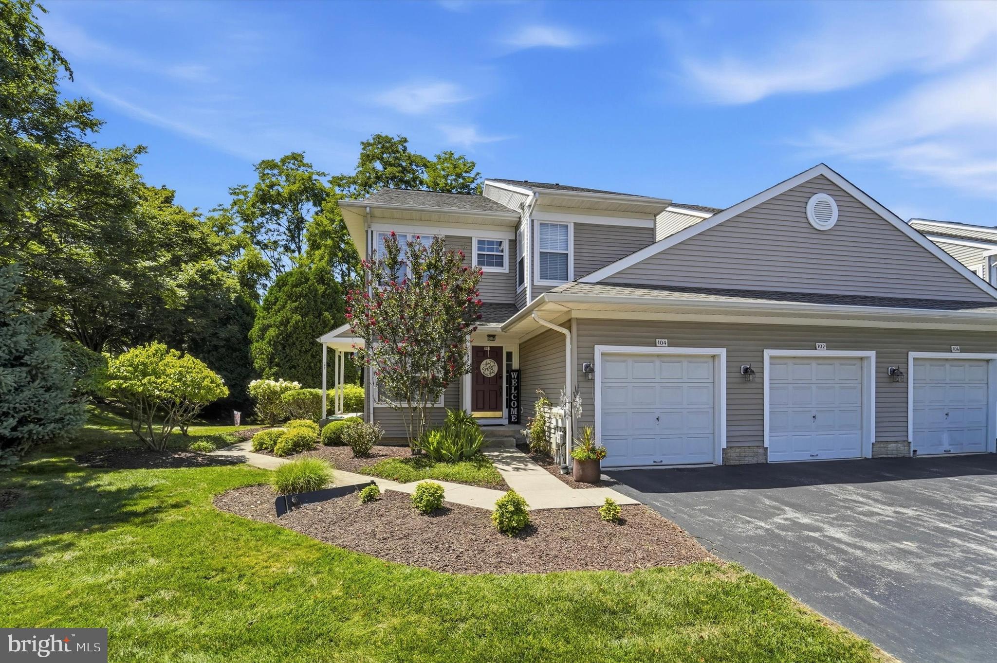 Welcome to 104 Jeffords Court, a beautifully maintained end-unit garden condo in the highly sought-after Charlestown Hunt community, located within the award-winning Great Valley School District. Offering 3 bedrooms, 2 full bathrooms, and a bright, open-concept layout, this home perfectly blends comfort, style, and low-maintenance living. Soaring vaulted ceilings and a neutral color palette create a light-filled, airy atmosphere throughout, while oversized windows invite an abundance of natural light. The spacious living room is anchored by a cozy gas fireplace and flows seamlessly into the dining area, making it ideal for both everyday living and entertaining. The well-appointed eat-in kitchen features rich hardwood flooring, timeless white cabinetry, granite countertops, stainless steel appliances, and a sunny breakfast nook surrounded by windows. The generous primary suite offers a peaceful retreat with a walk-in closet and a private en-suite bath complete with a double vanity, soaking tub, and separate walk-in shower. Two additional bedrooms provide exceptional flexibility for family, guests, or work-from-home needs, with the third bedroom currently serving as a home office/flex space. A second full hall bath and convenient main-level laundry complete the interior. Step outside to a spacious deck overlooking beautifully landscaped community open space—the perfect setting for morning coffee or relaxing evenings. Ideally situated just minutes from the vibrant shops, restaurants, and entertainment of downtown Phoenixville, major commuter routes, the SEPTA Regional Rail, parks, and corporate centers, this exceptional home offers easy, carefree living in one of Chester County's most desirable communities.
