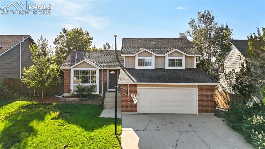 Well cared for beauty situated on a quiet Cul De Sac in coveted school district 20. Bright and open floor plan with vaulted ceiling and spacious living room that opens to kitchen with stainless steel appliances and granite countertops. Lower level features a nice sized family room with a cozy wood burning fire place and a wet bar area. French doors from family room lead to the patio that showcases a park like fenced rear yard with mature trees and landscaping. Updates include a newer water heater and furnace with AC. Upper level has a spacious master bedroom with a private bath. Upper level also includes two more bedrooms with a full bath. Basement area has two additional bedrooms and a bath. No HOA and close to schools, park, shops, and restaurants.
