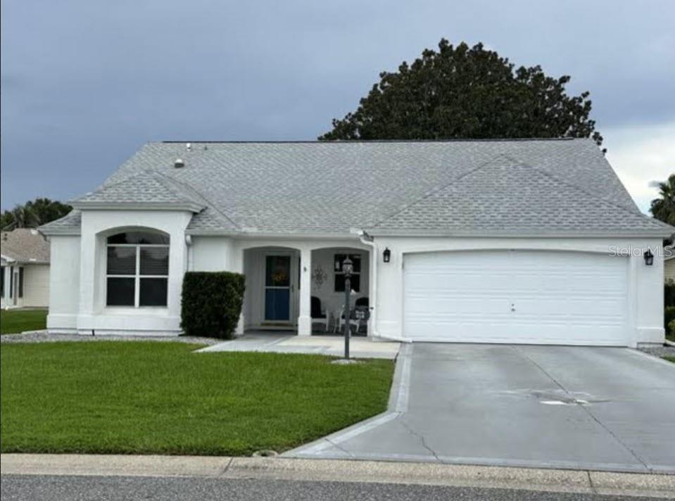 NO BOND. NO CDD. UNDER $300,000. ROOF 2023 HVAC 2017 HWH 2016  Professional photos coming FridayIf you have been looking for a home close to Spanish Springs without stretching your budget, I might be exactly what you have been waiting for.I am a two bedroom, two bathroom frame and stucco home located just a short golf cart ride from Spanish Springs, with the Chula Vista Pool and Recreation Center close by.Step inside and you will find brand new luxury vinyl plank flooring throughout most of my home, with tile in the primary bathroom and a different flooring finish in the guest bedroom. There is no carpet to worry about.Not everyone wants one big open room, and I understand that. My kitchen is separate from the main living area, giving you defined spaces and a little separation between cooking and relaxing. Behind the living room is another flexible area currently being used as a dining room, but it could easily become an office, reading area, hobby space, or whatever works for you.I also give you plenty of extra living space with a large Florida room and an enclosed lanai, perfect for enjoying the Florida lifestyle year round. I already have rain gutters in place.  That is super cool!At this price point, with my size, location, extra living space, and proximity to Spanish Springs, You get a lot of home for the money. Come take a look and see how easy it would be to make me your next home.