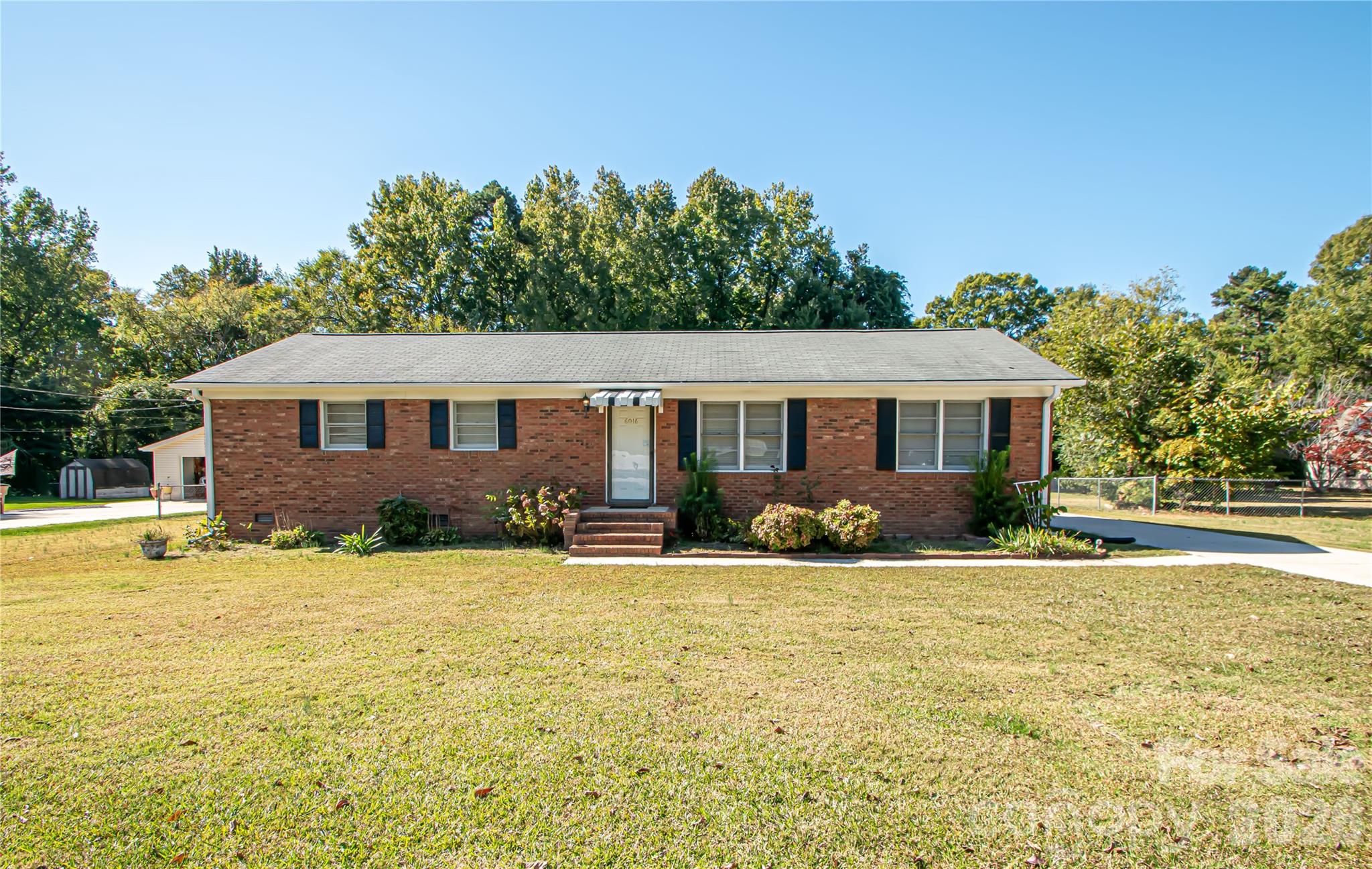 Priced over $50k below tax value!! Don't miss this full brick ranch on almost half an acre on the Union County side of Matthews!! A fantastic floor plan with four bedrooms and two and a half baths, this home has gleaming wood floors and great bones! Outside, you will find a spacious carport and a shed that provides ample storage! Huge level yard provides a blank slate to create a garden, space for entertainment, or whatever you imagine! HVAC 2018, water heater 2014! Don't miss this opportunity for immediate sweat equity in a great location!!
