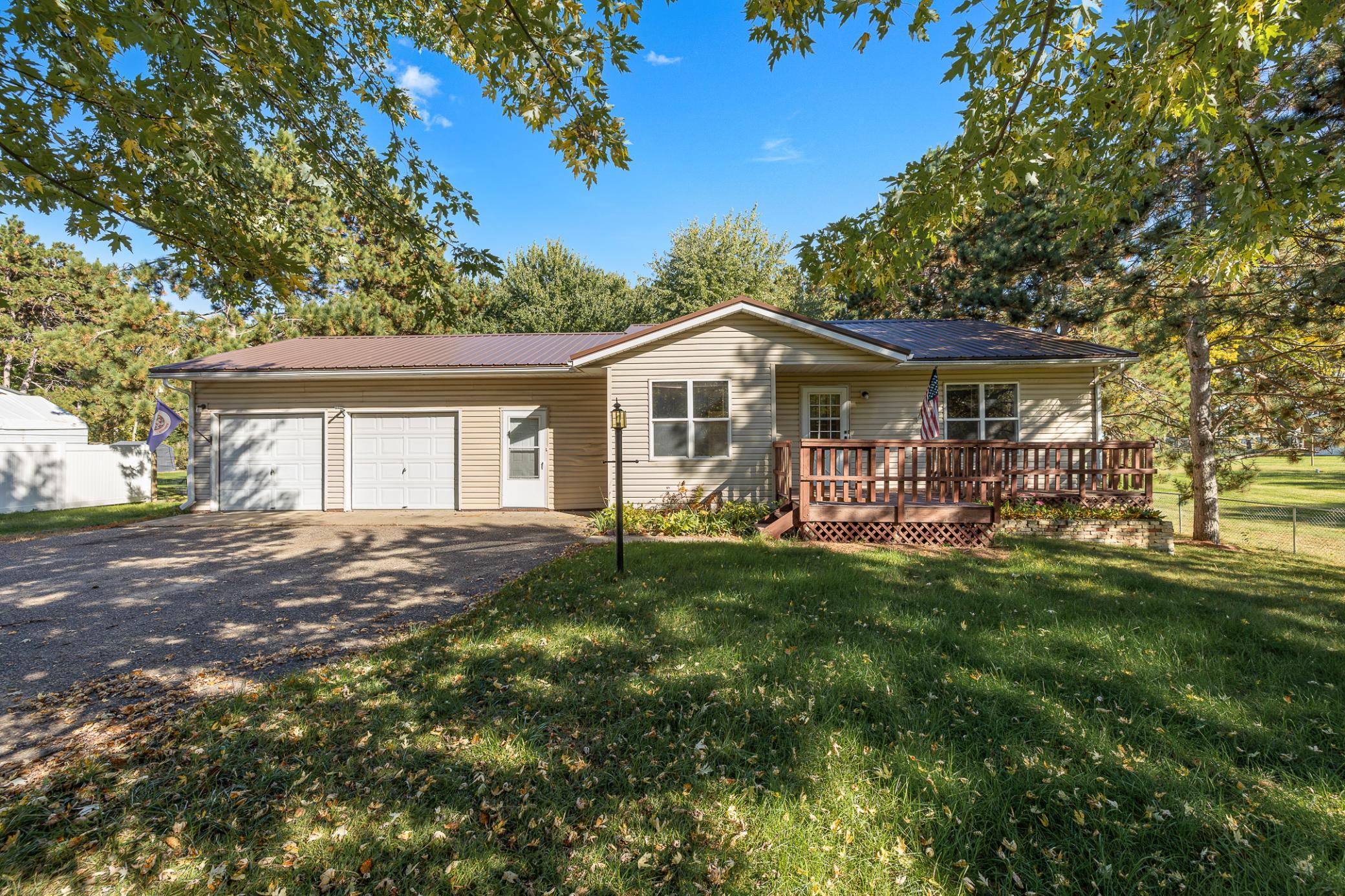 Assumable VA loan available at a rate of 5.125% to potentially reduce your monthly payment and stretch your budget! This lovely 3 bedroom/2 bathroom three-level split home is located in a highly sought-after neighborhood less than a block from the soccer fields and baseball complex! Enjoy the convenience of being just a short drive, bike ride, or walk to Taylor Twitchell Park and the new splash pad expected to open soon. The Mississippi River is also nearby, offering even more opportunities for outdoor recreation.Inside, the beautiful dining room features vaulted ceilings and an abundance of natural light, creating a warm and inviting atmosphere. The oversized 2 stall attached garage provides abundant storage, while the spacious backyard includes an additional garage - perfect for extra storage, hobbies, or all of your outdoor toys. Enjoy spending summer evenings entertaining on the deck and patio areas while relaxing in the peaceful and private setting.Come take a look today!