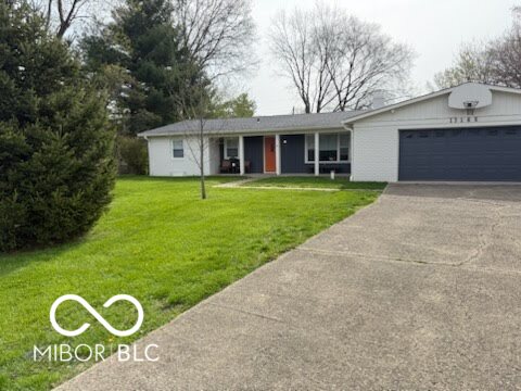 Nestled on Allisonville RD in FISHERS, Indiana, this recently Complete remodeled single-family residence offers an attractive property in great condition, poised to welcome you home.  The heart of this home resides in its meticulously crafted kitchen, where culinary dreams come to life amidst stone countertops and a captivating backsplash; a wall chimney range hood stands ready to whisk away any lingering aromas, while a tray ceiling adds an architectural touch of elegance, creating an inviting space for both everyday meals and special gatherings. The living room provides a warm and inviting atmosphere, anchored by a fireplace that promises cozy evenings spent in quiet contemplation or lively conversations.  Outside, a generous lot spanning 18731 square feet provides ample room for outdoor enjoyment, with a porch, and patio offering various vantage points to soak in the surroundings, while a fire pit sets the stage for memorable evenings under the stars.  This 1428 square foot ranch-style home, featuring three bedrooms and one full and one-half bathrooms, represents a harmonious blend of comfort and style, waiting for you to create a lifetime of memories.