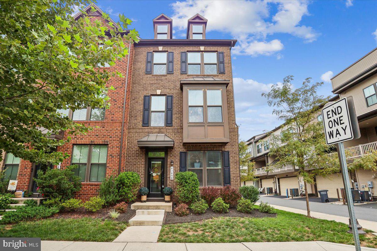 Welcome to one of the most desirable homes in Westmoore! Perfectly positioned as one of the closest homes in the community to the Ashburn Metro Station, this exceptional end-unit townhome has been thoughtfully upgraded well beyond the builder's standard finishes. Freshly painted throughout with brand-new carpet, this move-in-ready home combines luxury finishes, incredible natural light, flexible living space, and one of the community's most impressive outdoor living areas.Offering 3 bedrooms, 2 full baths, 2 half baths, a 2-car garage, and the same square footage as many of Westmoore's four-bedroom models, the lower-level flex space was intentionally left open to create a larger family room, home office, media room, playroom, or home gym. For buyers seeking a fourth bedroom, the space can easily be enclosed in the future while still maintaining exceptional functionality.The open-concept main level is the heart of the home, featuring hardwood floors, quartz countertops, a large center island, custom board-and-batten accent walls, upgraded lighting and fixtures, and an abundance of natural light that only an end-unit can provide. Every upgrade was carefully selected to create a home that feels both elegant and inviting.The true showstopper is the covered, screened porch featuring the upgraded stone gas fireplace—a rare builder upgrade that transforms the space into a true outdoor living room. Whether enjoying your morning coffee, entertaining friends, or relaxing by the fire on a cool evening, this resort-like retreat can be enjoyed nearly year-round.Upstairs, the spacious primary suite features a large walk-in closet and a spa-inspired bath with a soaking tub, oversized shower, and dual vanities. Two additional generously sized bedrooms, a full hall bath, and convenient bedroom-level laundry complete the upper level.Living in Westmoore means enjoying resort-style amenities including a clubhouse, outdoor pool, fitness center, parks, playgrounds, and miles of scenic walking trails. Best of all, this home is one of the closest homes in the community to the Ashburn Metro Station, making commuting to Tysons, Reston, Arlington, Washington, D.C., and Dulles International Airport exceptionally convenient. Just minutes from One Loudoun, premier shopping, restaurants, breweries, wineries, and major commuter routes including the Dulles Greenway (267), Routes 50, 28, and 7, this location truly offers the best of Northern Virginia.Premium end-unit. Luxury upgrades. Rare screened porch with an upgraded stone fireplace. Unbeatable Metro location. This is Westmoore living at its finest.