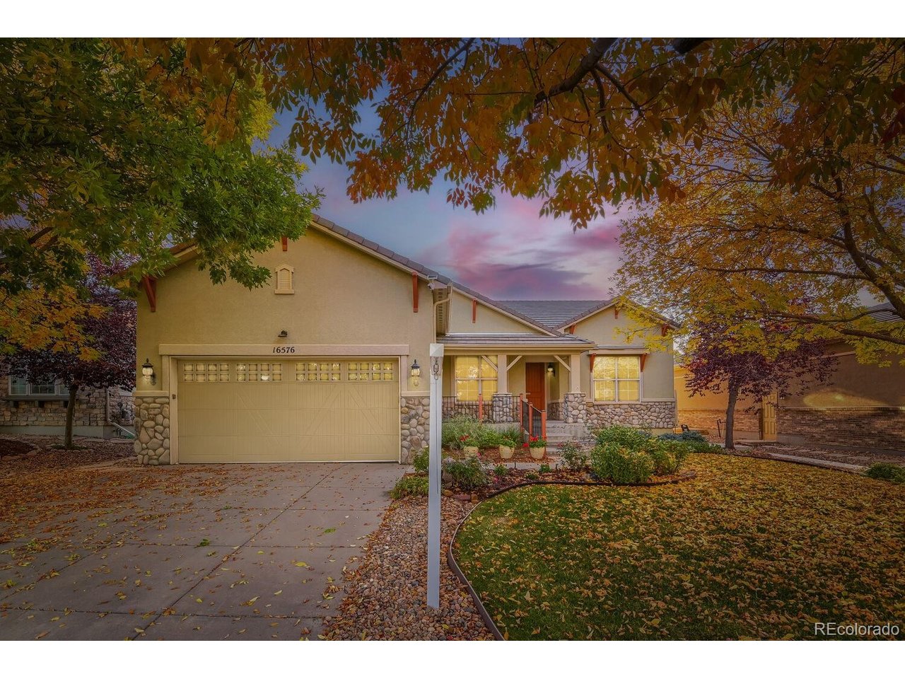 Welcome to this fantastic Keystone Pulte ranch home in Anthem Ranch, ideally situated backing to a private greenbelt for added privacy and serene views. This beautifully upgraded home offers over 1,900 sq. ft. finished on the main level, featuring an open and inviting floor plan with hardwood flooring, newer carpet, fresh interior paint, and numerous thoughtful updates throughout.The gourmet kitchen is a true standout with new GE Cafe white appliances, abundant cabinetry, generous counter space, and both an eat-in area and a separate dining room-perfect for everyday living and entertaining. The cozy gas fireplace creates a warm focal point in the living area.The spacious primary suite features a luxurious 5-piece bath and a large walk-in closet. A second bedroom and full bath provide comfortable accommodations for guests or flexible living needs.The full 1,900+ sq. ft. basement is a tremendous opportunity for additional living, recreation, storage, or future finishing. It includes a water softener system and sits on a newly poured concrete floor, providing an excellent foundation for your vision.Step outside to enjoy the newer large stone patio, upgraded landscaping, and a new slider door leading to the newer deck with durable composite decking and new railings. The private greenbelt backdrop makes this outdoor space especially inviting.Located in the highly desirable 55+ Anthem Ranch community, residents enjoy the exceptional 30,000 sq. ft. lodge, fitness facilities, more than 130 clubs, miles of trails, social activities, and an incredible calendar of events. This is Colorado ranch living at its finest-beautifully maintained, extensively upgraded, and ready to enjoy!