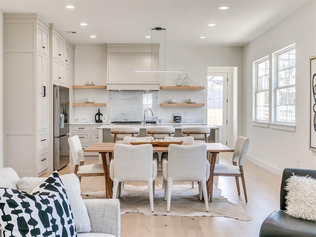 Welcome home to 1112 NW 47th St. located in the Helm Farm community. This lovely new construction build is a show stopper. Welcome your guests into the foyer and lead them into the open concept living area with soaring 20' ceilings. The family room features tons of natural light, modern fireplace and a wetbar area. Dining room is perfect for entertaining and easily fits a large table. The Kitchen is truly a dream. Features include marble countertops, custom cabinets, Forno 48'' 6 burners stove with a double move, and a large walk-in pantry. The large covered back porch features a vaulted ceiling and is a great place to relax at the end of the day. Primary Suite is tucked away in the back of the home and is large in size. Primary bathroom features dual vanities, separate tub/shower and a walk-in closet that connects to the laundry room. There is also an amazing powder bathroom downstairs that has the most stunning quartzite countertops. When you go upstairs, you will love the open walkway to the living area. There is a bonus room with powder bath at the front of the upstairs of this home. Then you will find two ample size guest suites which share a bathroom. There is a second primary suite upstairs as well with a beautiful bathroom and walk-in closet. Other features include hardwood floors, tankless hot water tank and instant hot water. Schedule your private showing soon ! This home is truly one of a kind, and this location is amazing. Located so close to many restaurants, shopping and of course easy highway access!