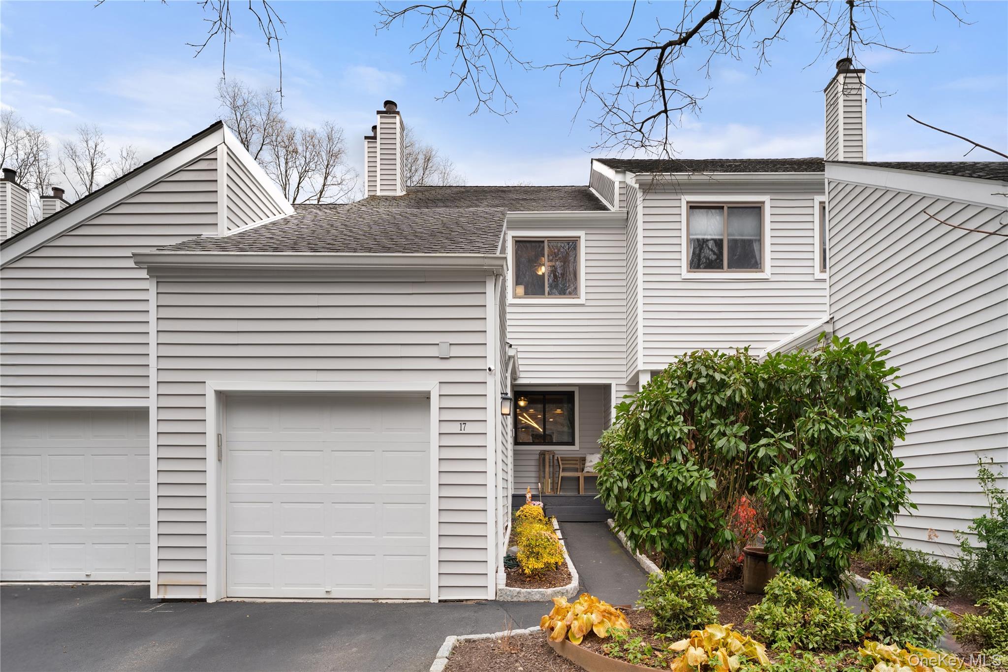 Welcome to 17 Ledgewood Commons in the highly desirable Chappaqua Central School District! This 3 bedroom, 3 bathroom condominium is ready to welcome you home! Upon entering you will find an updated eat-in-kitchen with stainless steel appliances and granite countertops. The open concept living room and dining room make entertaining a dream. Upstairs you will find the primary bedroom, complete with an ensuite bathroom and walk in closet.  Two additional bedrooms, a full hall bathroom and the washer/dryer complete the second floor. Don't miss the newly finished basement with plenty of versatility for hanging out, office space, and a play area. Not to mention, tons of storage! Outside you will find a brand new deck and patio with your very own rock garden equipped with solar lights. Head out to the lush green backyard which offers easy access to the North County trail for daily walks right in your own backyard! Don't forget to check out the community playground and pool on your way out! Recent upgrades include, fully finished basement (2024), new deck and patio (2024), new AC/Furnace (2023).