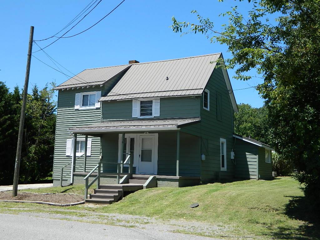 Take a look at this refurbished 4 BR, 2 BA home. Recent updates and ready for new owners. New flooring on both levels, new bath fixtures on both levels. New utility room with washer and dryer hookups installed. Kitchen has new countertops and appliances. Fresh paint and new light fixtures throughout. Beautiful lot with privacy fence at the back. Baseboard heaters are new. There is a little "tiki hut" in the back yard with patio access for entertaining. Can be used for storage also. Thermopane windows and metal roof. Front covered porch for lazy day snoozes. Concrete drive. Take a look today!