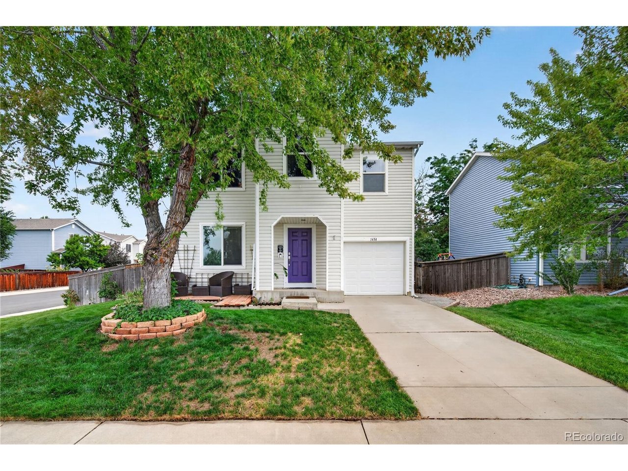 Welcome to 1454 Goldeneye Ln, a beautifully updated 4-bedroom, 2-bath home offering 1,470 square feet of comfortable living space in Brighton. Ideally positioned directly across the street from a large lake, this home enjoys beautiful lake and mountain views, colorful Colorado sunsets, and even seasonal bald eagle sightings-a peaceful setting that makes this property truly special.Step inside to an open and inviting main level featuring an updated kitchen with Corian countertops, stainless steel appliances, painted cabinetry, under-cabinet lighting, and a spacious walk-in pantry. The nearby laundry closet includes the washer and dryer for added convenience.  Upstairs you'll find four bedrooms, including a primary suite with lovely views of the surrounding scenery, a walk-in closet, and an updated private bath. Three additional bedrooms provide flexibility for family, guests, a home office, or workout space.  The home has been thoughtfully refreshed with new flooring, updated countertops, remodeled bathrooms, and fresh interior paint. Additional upgrades include smart switches throughout, a smart garage, smart thermostat, Ring system, and updated ceiling fans and light fixtures. Major improvements have also been taken care of, including new water heater in 2025, HVAC replaced in 2019, and roof in 2019.  Outside, enjoy a fully fenced backyard with plenty of space to relax, entertain, garden, or let pets play. Across the street, the lake provides a beautiful backdrop and a wonderful place to enjoy the changing seasons and sunsets over the water.  Nearby neighborhood amenities add even more to the lifestyle, with trails, courts, a playground, grills, and a catch-and-release pond all close by. With its combination of updates, smart-home features, outdoor space, beautiful views, and convenient community amenities, 1454 Goldeneye Ln is ready to welcome its next owner.