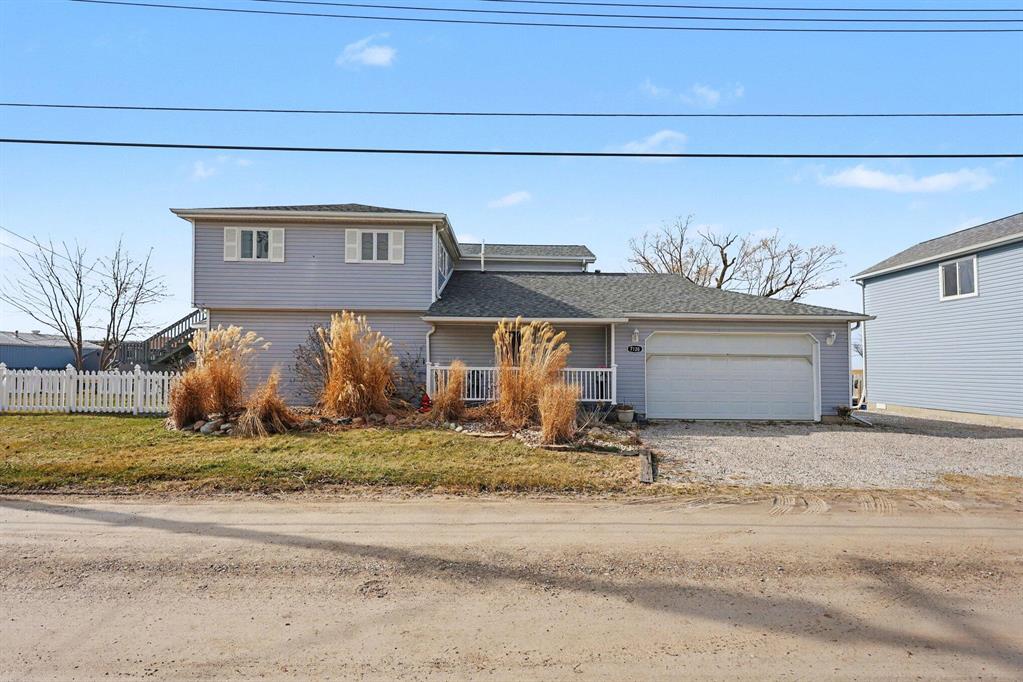 Welcome to Island Living at Its FinestTucked away on one of Harsens Island's most coveted canals, this exceptional 3-bedroom, colonial delivers the waterfront lifestyle you've been waiting for. Set on an oversized 12,810 square foot parcel spanning .34 acres with an impressive 175 feet of canal frontage, this property offers the kind of scale and breathing room that is increasingly rare on the island.With 2,281 square feet of above-grade living space, the home's colonial architecture provides generous, well-proportioned rooms that are equally suited for year-round living or a premier seasonal retreat. The layout flows naturally, giving every level of the home a sense of purpose and comfort.Positioned off the primary channel, this property sits in a quieter, more protected setting while still delivering direct access to the all-sports waters of Lake St. Clair, one of the Midwest's premier boating destinations. Whether you're cruising open water, fishing, or simply enjoying a sunset from your own backyard, you are always minutes from the action.For the boating enthusiast, the attached garage with its own dedicated boat well is a standout feature and one that is genuinely hard to come by on the island. Covered, protected, and built into the property's footprint, it keeps your watercraft ready for the water without the hassle of a trailer or a marina slip.Modern comfort has not been overlooked either. A tankless hot water heater ensures on-demand efficiency year-round, a welcome upgrade that makes this home as functional as it is desirable.With 175 feet of canal frontage on a parcel this size, you have the space to spread out, dock your toys, and truly enjoy the water from multiple vantage points. Properties combining this much frontage, square footage, garage boat well access, and proximity to Lake St. Clair on Harsens Island simply do not come along often.This is your opportunity to own a true island gem in Clay Township, St. Clair County, where the pace slows down and the water is always calling.