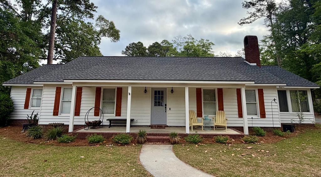 The perfect family home tucked away on a quiet cul de sac in beautiful Thomasville!! This 3 bedroom 2 bath home is a real dream in layout and location! The home features an open living area layout that allows the joy of entertaining to flow seamlessly from the living room to the kitchen. The kitchen offers plenty of counter space and ample storage for the aspiring home chef. Off the dining and living room you will find a very large sunroom that extends the living space and can be used as a den, office, playroom, or the perfect reading area. Down the central hallway you will find the 3 large bedrooms. The primary suite has his and her closets and a separate water closet for the shower and toilet. The guest bath will not disappoint in size with the large double vanity allowing for tons of counter space. Once outside you will find a large patio overlooking almost an acre fully fenced in. The backyard is complete with two outbuildings for the whole families needs, including a 24'x30' wired garage!! Don't miss your chance to get a move in ready home just a golf cart ride to downtown! Seller is a licensed real estate agent.