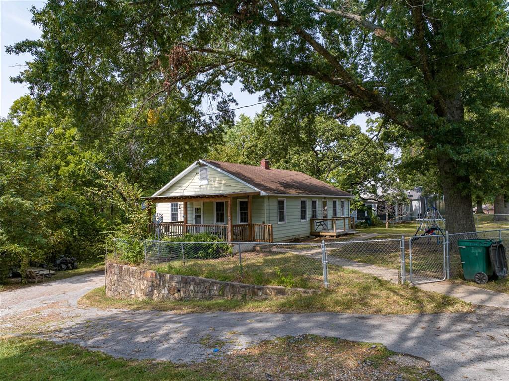 Nestled in the heart of Osceola, Missouri, this charming home is a dream come true for fishing enthusiasts! Located just a stone's throw from the scenic Sac Osage River, you'll have endless opportunities for casting your line and reeling in the big one.

This cozy abode features two comfortable bedrooms and a dedicated office space on the main level, perfect for remote work or pursuing your hobbies. The single bathroom is conveniently located and well-appointed. Step outside onto the covered patio, where you can relax and unwind with family and friends, enjoying the peaceful surroundings.

But that's not all – the walk-out basement boasts a fantastic studio-style apartment, offering additional living space for guests or potential rental income. With its prime location and desirable features, this property is an angler's paradise and a wonderful place to call home.