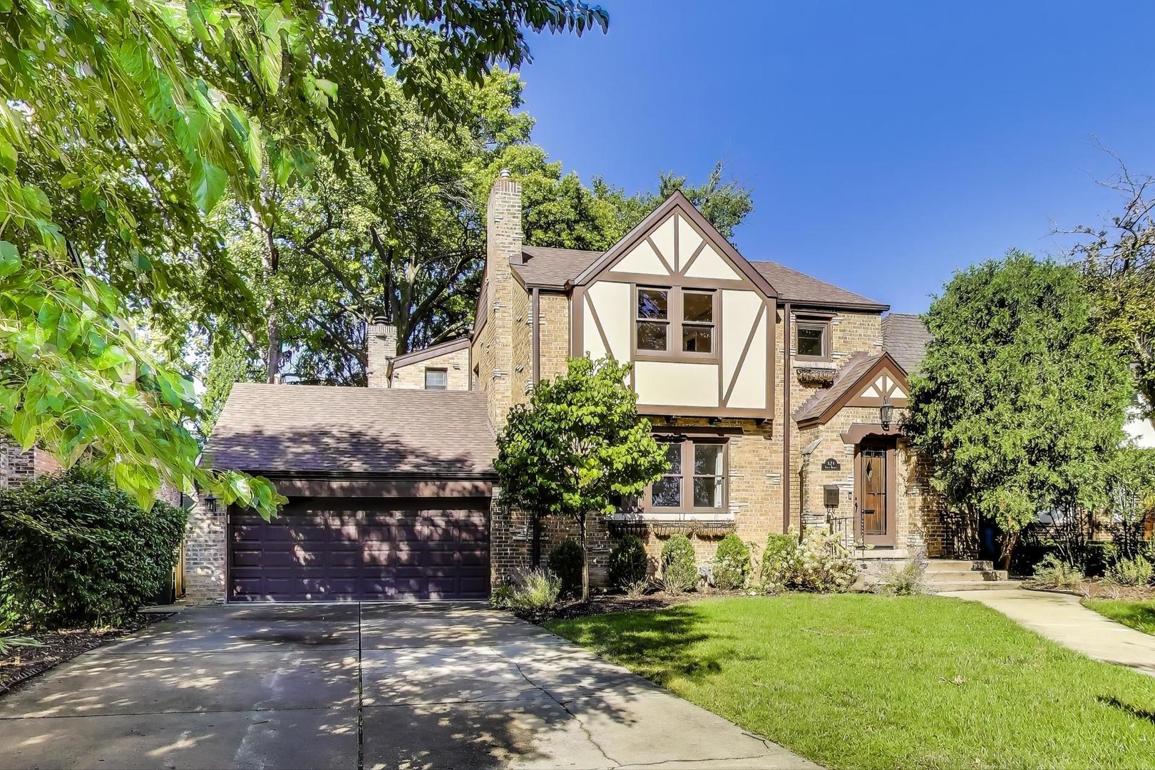 Storybook English Tudor with brick addition in ideal Country Club location. Old world charm meets modern luxuries with two-car attached garage, 1st floor laundry/mud room, and primary suite with remodeled luxurious bath (2022). Chef's kitchen with granite counters, center island, and tons of cabinetry. Perfect home for entertaining. Ballroom-sized family room leads out to deck and covered porch overlooking fantastic, fenced-in backyard (lot 60x160). Gleaming hardwood floors and trim throughout. Remodeled basement (2014) with 2nd half bath, rec room, theater area and gorgeous bar with new quartz countertops. Plenty of storage. Peace of mind with newer roof (2021), 200 amp service, copper plumbing throughout, multiple sump pumps, and Parks System in front yard.  Award-winning Field Elementary (1 block away), Emerson Middle, and Maine South High School. 2 Blocks to Northeast Park, 6 blocks to Whole Foods and less than a mile to Uptown Park Ridge (Metra station, Trader Joe's, restaurants, and more).