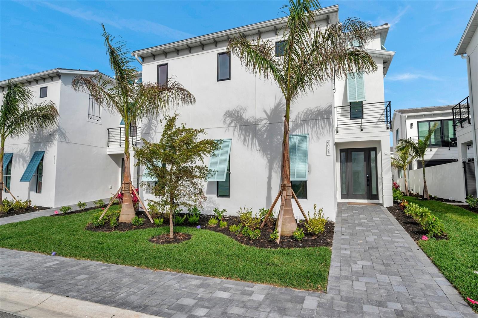 Also Available for Rent.
Brand New 2025-Built Salt Meadow Two-Story Residence on a Premium Lot, Steps away from Aqua’s 4-Acre Blue Lagoon

This exquisite Salt Meadow two-story residence offers exclusive access to Aqua’s 4-acre translucent blue lagoon and tropical beach, featuring world-class amenities. The sparkling lagoon and soft sandy shore provide an idyllic setting for swimming or relaxing with family and friends while enjoying the bay breeze and Florida sun.

Boasting over 4,000 square feet of meticulously designed living space, this home comprises four spacious bedrooms and four luxurious bathrooms.

Notable Features Include:
Expansive open floor plan enhanced by abundant natural light;
 Gourmet kitchen with custom Serenity Kraft Maid cabinetry, quartz countertops, a large island, and a premium LG Signature Range featuring gas, induction, and sous vide capabilities;
Private courtyard oasis with heated pool, waterfall feature, and lanai prepared for an outdoor kitchen;
Elegant primary suite with walk-in closet, private balcony, and spa-inspired bathroom featuring soaking tub and frameless rain shower;
Walk-in closets in all bedrooms with en-suite or adjacent bathrooms;
Convenient second-floor laundry room and two-car garage;
Elevator prep. ready;

Located in one of Florida’s most sought-after non-flood zones, Aqua offers convenient access to IMG Academy, world-class golf courses, the beaches of Bradenton and Anna Maria Island, Sarasota Bay, SRQ Airport, and the University Town Center Mall.