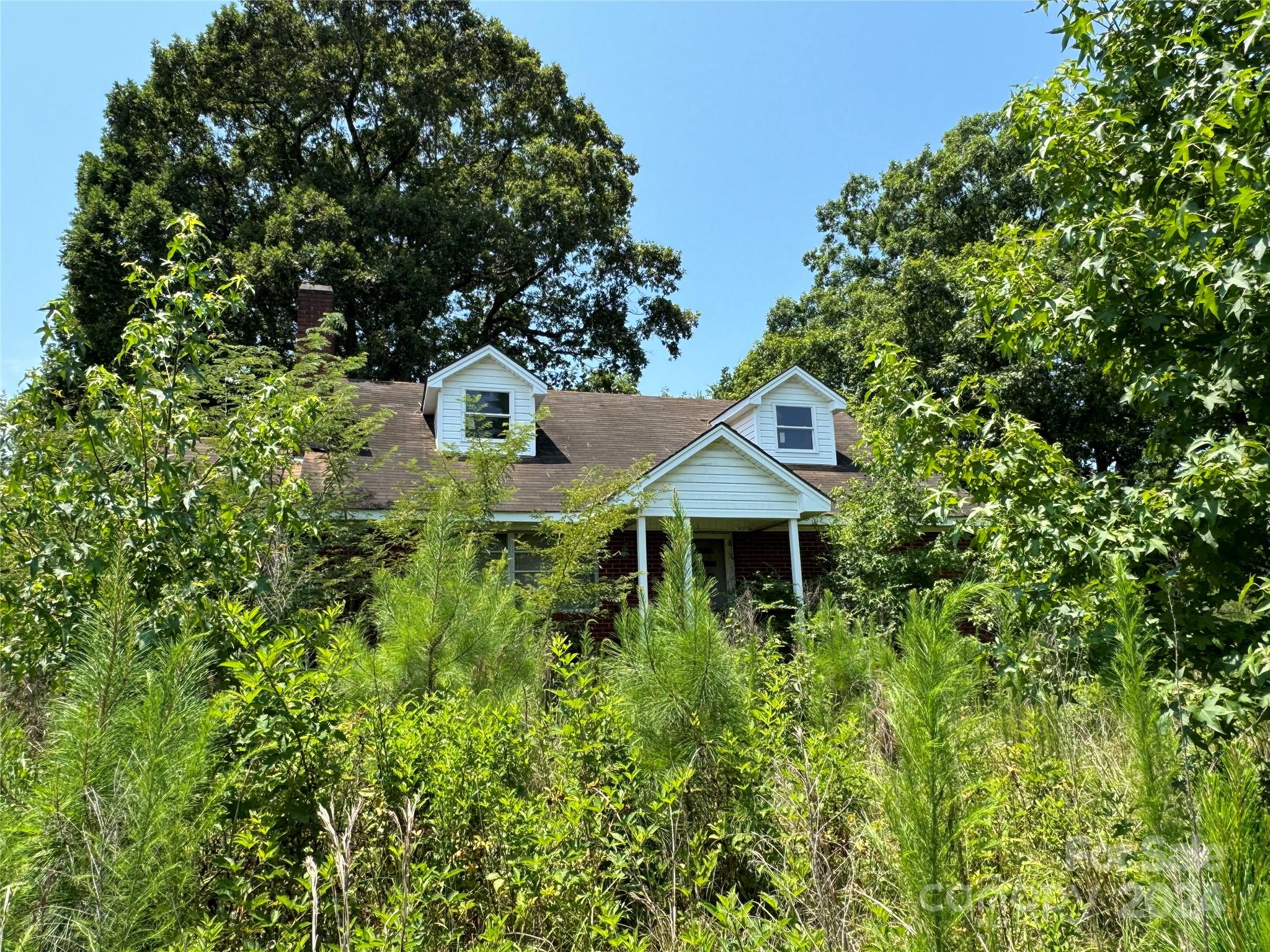 Approximately 378.40 acres in Mount Gilead.  Brick/ Vinyl house with 3 bedrooms and 2 baths, however it has been vacant for several years and will need some work.  There is another house of no value and is falling in.  Property has timber.  There is a cement block building approximately 100x50.  
SHOWN BY APPOINTMENT ONLY!!