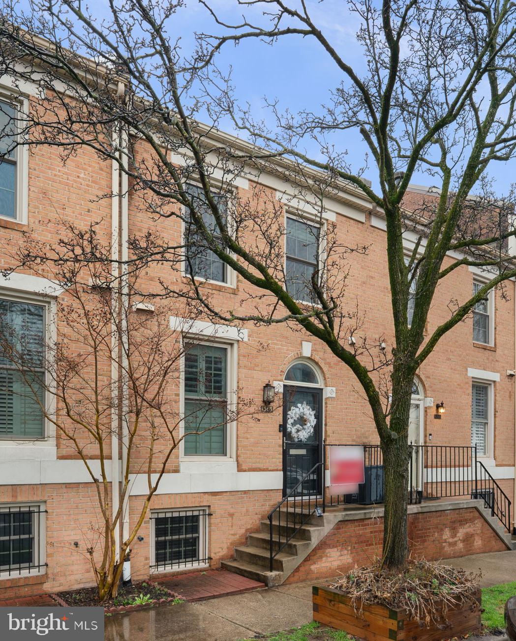 BEAUTIFUL WATER VIEWS!! Welcome to 1305 S Potomac Street! Located in a beautiful townhome community in the heart of one of Baltimore’s highly desirable Canton neighborhoods. With a beautiful view of the harbor and just a few blocks from Patterson Park, this home offers the perfect balance of city convenience and neighborhood charm.    As you step inside, you'll notice the delightful kitchen featuring quartz countertops, modern appliances, and ample cabinetry for storage and everyday functionality.  From here, the home opens into a comfortable dining and living area finished with luxury vinyl flooring throughout the main level. The living room features a cozy wood-burning fireplace that adds warmth and character to the space. This bright and inviting area flows directly to the fenced backyard, where a beautifully finished patio creates the perfect setting for outdoor dining, relaxing, or entertaining.    Upstairs, you’ll find newer carpet throughout the upper level. The primary bedroom features vaulted ceilings that add a sense of openness and character, while the additional bedroom provides flexibility for guests, a home office, or additional living space. A full bathroom completes this level.    The finished lower level further expands the living space and features a 2nd full bath and an additional wood-burning fireplace in the rec room, which creates a versatile area that can serve as a family room, recreation space, workout area or home office.    Located in the highly desirable Canton Square, this home places you just minutes from some of Baltimore’s best amenities. Enjoy morning walks or weekend festivals at Patterson Park, waterfront dining along Boston Street, walking the promenade of the Inner Harbor and the vibrant shops, restaurants, and nightlife of Canton Square and Fells Point. Commuters will appreciate quick access to I-95, I-895, and I-83, making travel to downtown Baltimore, Johns Hopkins Hospital, the Inner Harbor, and BWI Airport seamless.  Enjoy one assigned parking plus an abundance of angled street parking.    A rare opportunity to rent a charming home in one of Baltimore’s most sought-after neighborhoods—schedule your private showing today and experience everything 1305 S Potomac Street has to offer.