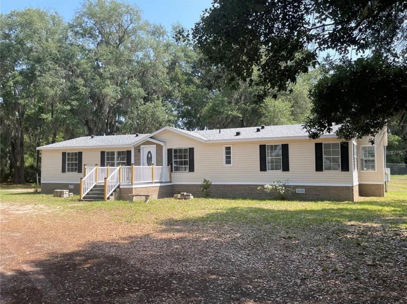 Welcome to 30349 Elam Rd, a charming Single Family home located in the heart of Wesley Chapel, FL. This lovely property was built in 1999 and boasts a spacious interior with a total of 2 bathrooms and no half bathrooms. With a finished area of 1,838 sq.ft., there is plenty of room for all your living needs. Situated on a generous lot size of 25,792 sq.ft., there is ample outdoor space to enjoy and entertain. As you step inside, you are greeted by a warm and inviting atmosphere that is perfect for creating lasting memories with loved ones. The open floor plan allows for seamless flow between the living, dining, and kitchen areas, making it ideal for gatherings and entertaining. The kitchen is equipped with modern appliances, plenty of cabinet space, and a breakfast bar for casual dining. The master bedroom is a peaceful retreat with an en-suite bathroom for added convenience. The additional bedroom is perfect for guests, children, or a home office. Both bathrooms are well-appointed with stylish fixtures and finishes. The home also features a laundry room for added convenience. Outside, the expansive yard offers endless possibilities for outdoor enjoyment. Whether you want to relax on the patio, have a barbecue with friends, or start a garden, there is plenty of space to make this outdoor oasis your own. The lush landscaping adds to the curb appeal of the property and creates a serene environment. Located in Wesley Chapel, FL, this home is conveniently situated near top-rated schools, shopping, dining, and entertainment options. With easy access to major highways, commuting to Tampa or other nearby cities is a breeze. Don't miss this opportunity to own a piece of paradise in a desirable location. Overall, 30349 Elam Rd is a wonderful place to call home with its comfortable living spaces, beautiful outdoor area, and convenient location. Don't wait, schedule a showing today and make this property your own!.
