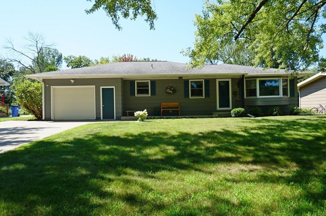 Taking Backups - Contact Agent. Beautifully finished hardwood floors and quality finishes throughout create a warm, inviting feel in this 4+ bedroom home with over 2,325 finished sq ft. The main level features an open living room, formal dining room with skylight, and a custom kitchen complete with breakfast bar and new appliances. The dining room opens to a 4-season room, creating an ideal space for relaxing or entertaining. Down the hall are three bedrooms and a full bath. Two large hall closets and a half bath provide added convenience. The basement expands the living space with a family room and supersized bedroom featuring two separate sleeping areas, each with double closets and a built-in desk. The basement also includes a utility room with laundry and a storage room with a workbench. New furnace and AC installed July 2026. The attached garage (26 ft x 16 ft) has room for parking and storage. Enjoy the outdoors from the covered front porch and the back patio with gazebo and privacy fence. The yard offers fresh landscaping, garden areas and mature trees. New exterior doors and shutters give a pop of color. Ideally situated in a desirable neighborhood, just blocks from the Middle School and High School campuses and Lincoln Elementary School, with the Charley Western Recreational Trail right out your back door. This is a wonderful place to call home!