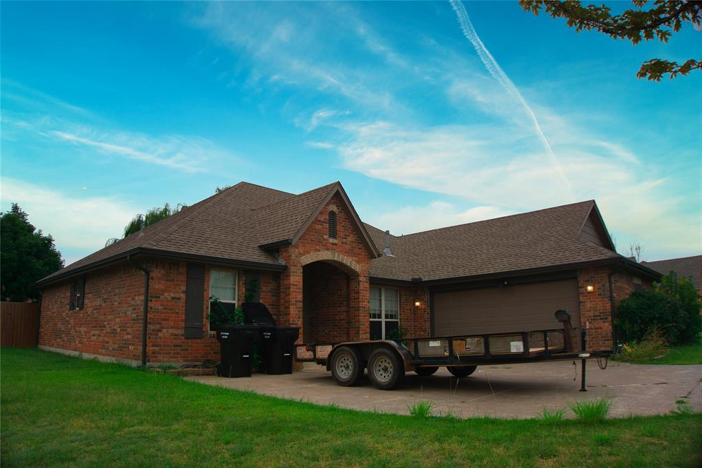 The highly sought-after Lake Woods addition offers a perfect blend of comfort and convenience! This home is ideally located near the community’s stocked pond and walking trails. Featuring 3 bedrooms, with the owner’s suite privately separated from the two guest bedrooms, the layout ensures both privacy and functionality. A dedicated study/office with a closet and window can easily serve as a 4th bedroom. The spacious living room accommodates a large sectional and boasts a cozy fireplace with rich wood trim accents. The owner’s suite is generously sized, with an ensuite bath offering a separate shower and jetted tub. The oversized walk-in closet includes a built-in chest for added storage. Additional highlights include an in-ground storm shelter in the garage for peace of mind. Located within a district of highly rated schools.