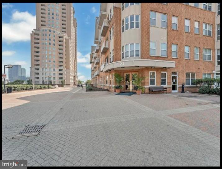Available Now! Welcome to waterfront living in the sought-after Harborview community! This spacious 2-bedroom, 2-bathroom first-floor condominium offers the convenience of a private walk-out patio, perfect for relaxing or entertaining.The home includes one assigned parking space, with additional parking available. Pets are welcome (subject to owner/association approval).Residents enjoy an exceptional amenity package, including:24-hour front desk concierge24-hour securityIndoor health club/fitness centerCommunity centerOutdoor swimming poolBeautiful waterfront walking paths and common areasonsite restaurant/cafe Conveniently located just minutes from Downtown Baltimore, Federal Hill, I-95, and local dining and entertainment.Available for immediate occupancy.Text the listing agent today to schedule your private showing!