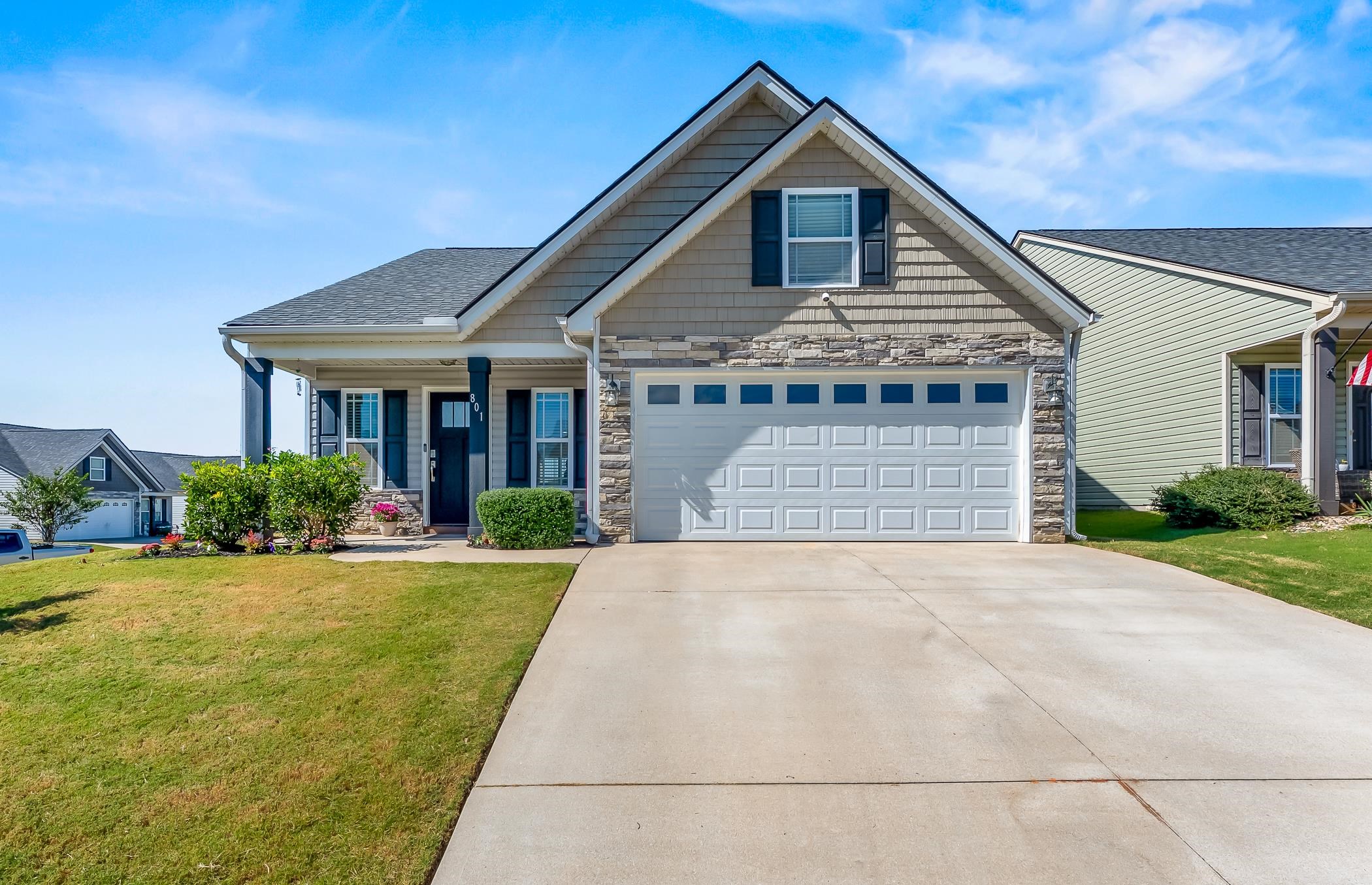 Welcome to 801 John Thomas Way - a well maintained, move in ready single family home built in 2017, nestled in one of Greer's most sought after communities. With 3 bedrooms, 2 bathrooms, and thoughtful design, this home strikes a perfect balance of modern comfort, convenience, and neighborhood charm.  All new flooring installed this Sept.