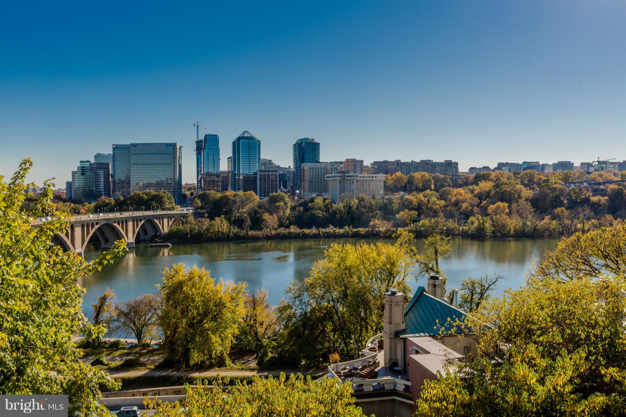Beautiful Federal residence with unparalleled views of the Potomac River & Key Bridge, and just steps to shops, restaurants and Georgetown U. Decks on all levels, each bedroom has own bath.  2 car, Tandem, in attached garage. Light, Bright,  living room, and dramatic marble wall and gas fireplace.  Each room has special and unique  touches and views!  Built-ins.  Renovated kitchen.  Appointment only.- Tenants responsible for obtaining; renters insurance, and utilities.-Use RentSpree for application.Each applicant over 18 must fill out their own application.  Applications are $49 each Vouchers welcome.  Landlord will complete a credit and background check as allowable by DC law.