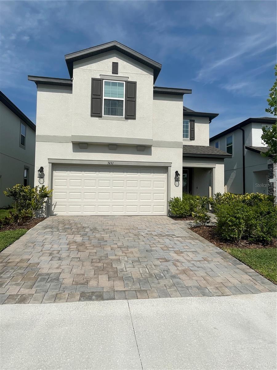 GATED COMMUNITY • 4 BEDROOMS • 3 FULL BATHS • DOWNSTAIRS BEDROOM & FULL BATH • HUGE UPSTAIRS BONUS ROOM • OPEN FLOOR PLAN. Welcome home to this beautifully maintained 4-bedroom, 3-bath residence offering a spacious and versatile floor plan in a desirable gated community. The open-concept main level seamlessly connects the kitchen, dining, and living areas, creating an inviting space for everyday living and entertaining. A full bedroom and bathroom downstairs provide excellent flexibility for guests, a home office, or multigenerational living. Upstairs, the expansive primary suite features a generous walk-in closet, along with two additional bedrooms and a spacious bonus room that can easily serve as a media room, game room, office, or additional living space. The laundry room is also conveniently located upstairs, and the washer and dryer are included. The garage features sturdy storage racks, providing plenty of additional organization and storage space. Ideally positioned directly across from the community playground, this home offers a peaceful neighborhood setting with everyday conveniences close by. Enjoy quick access to shopping, dining, Publix, Target, Starbucks, Chick-fil-A, and more. With its flexible layout, downstairs bedroom and bath, spacious bonus room, gated setting, and convenient location, this home has plenty to offer its next owner!