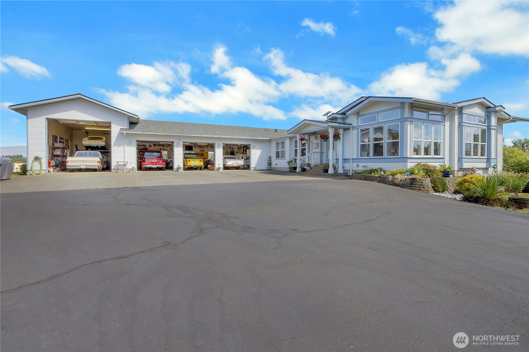 Beautiful inside & out! This Hobby Farm has it ALL! Solar-Powered auto Gate opens to your paved driveway on Park-like private grounds! Mountain view & Spring-fed pond. 3 parcels = 24+ acres. Over 5,000 SF of living space includes mother-in-law/guest quarters w/rec rm, dining rm, full kitchen, laundry & bath in fully finished daylight basement. Main level has laundry rm/mud rm, office, formal living & dining area, large updated kitchen with Island that has beautiful views of pasture. Family rm has French doors that open to newer remodeled 32'x16' deck, overlooking your herd or flock. HUGE primary bedroom suite with shower & garden tub, BIG sitting room walk-in closet Plus Jack & Jill closets. Addl. bedroom & full bath. 80x100 metal barn, addl. barn w/3 stalls, fenced & crossed fenced w/no climb pasture fencing for animals, Dog run. New roof, Insulated & sheet rocked 18x40 RV garage Plus 50x30 oversized 3 car garage attached. 16x10 Greenhouse, Rose garden, Vegetable gardens, Apple, Cherry, Pear, Fig Fruit Trees, grape vines, strawberry patch, blueberries & blackberries. 15 zone sprinkler system, 50 gal per min. individual well & above ground pool. Relax in your Gazebo overlooking heart-shaped water fountain or under your large covered patio w/ Bull Frog Hot tub. High speed Starlink internet, Security system, wired for generator. Plus your own shooting range! Bring your all your toys, cows, horses or sheep! Too much to list, Priced to sell! Your paradise, just minutes from I-5!