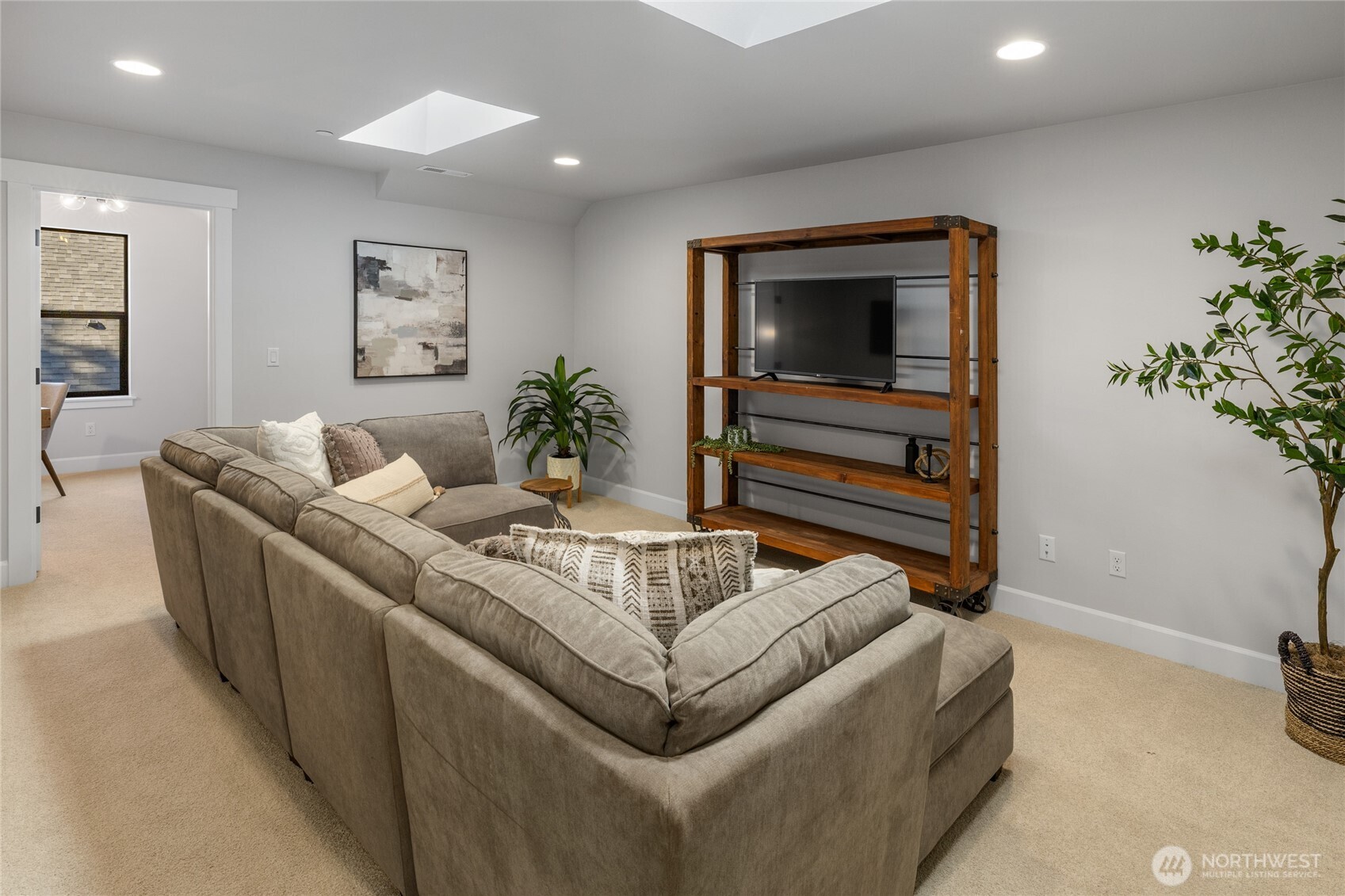 2nd floor family room with skylights.
