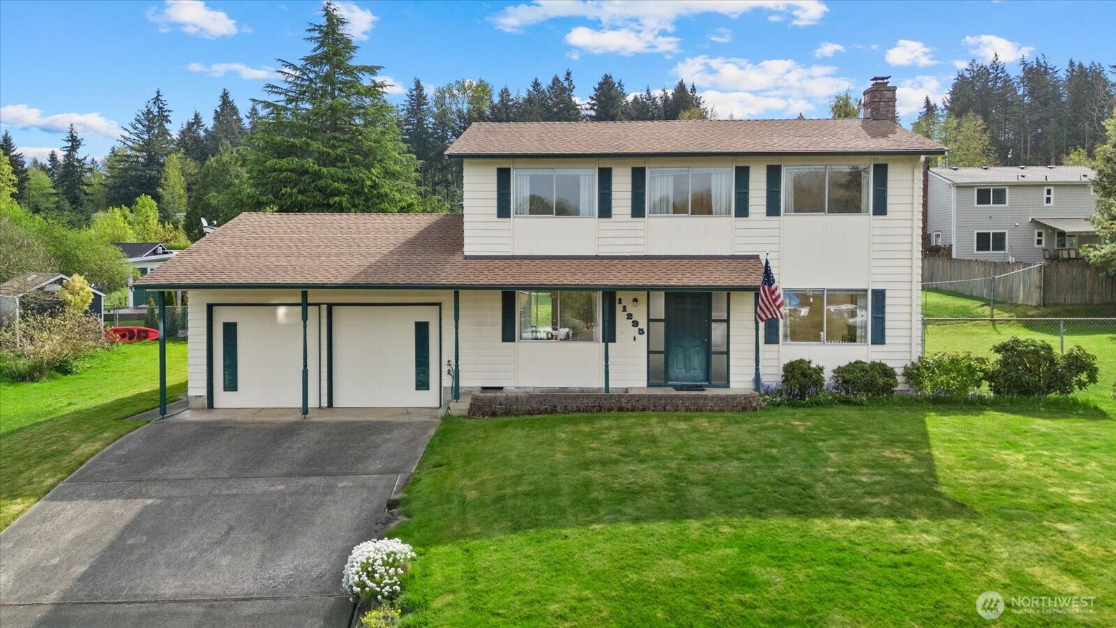 WOW!! Fantastic & STANDING PROUD 2 Story 1540 SF 4 Bedroom Home w/ HUGE 770 SF and Space For 4 Cars Stacked Attached Garage or SHOP Area w/ 10 ft TALL CEILINGS. LOCATED on a PLUSH LANDSCAPED 7,440 SF LOT AT END OF CUL-DE-SAC THIS ONE OWNER HOME is Located In Sought After KIRKLAND & NORTH SHORE SCHOOLS. The Home is Well Maintained, But Needs Some Updating And Fresh Paint BUT WOW HUGE UPSIDE POTENTIAL Perfect For a FLIP BUYER Who wants to Update & Sell OR FOR A BUYER Who Wants To Earn Some Instant Equity. AT THIS PRICE TREMENDOUS VALUE and Home Can Be Lived in As Is Now. The Home Has A Custom Installed Gas Supplied Radiant Heating System. There is Also a Heated Concrete Floor Drive Way. PERFECT To Redo The Kitchen and Open it To Dining Room. The Upstairs Has Roof Trusses So Inside Walls Can Be Moved To New Buyers Updated Choices. A New Roof was installed in 2020 PLUS THE OUTSIDE SIDING IS 1/2 X 8 CLEAR CEDAR WITH MITERED CORNERS TREMENDOUS UPSIDE IN KIRKLAND AREA Better Hurry on this One its a RARE OPPORTUNITY !!!