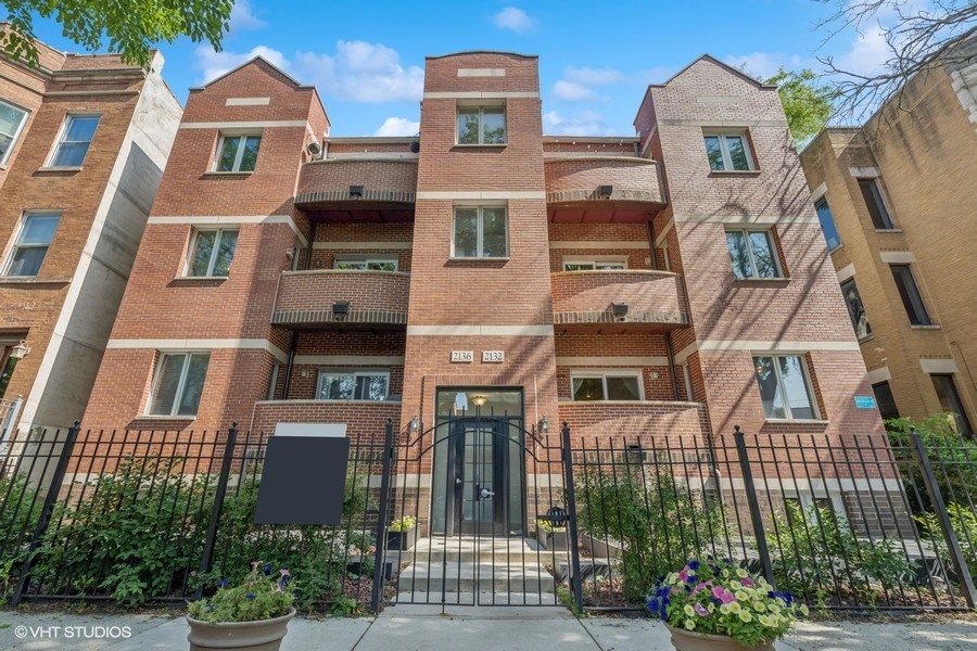 Beautifully updated and effortlessly livable 2-bedroom/3-bathroom, this two-level Wicker Park home offers a perfect blend of character, light, and space - tucked on a quiet, tree-lined street in one of the city's most vibrant neighborhoods. A bright and modern kitchen anchors the main floor with plenty of room to gather, cook, and unwind, while the fully finished lower level offers exceptional flexibility for a second living area, media room, or home office setup. The spacious primary suite features a dual-vanity, walk-in shower with separate tub, and a massive walk-in closet lined with built-in shelving. Thoughtfully designed and move-in ready, this is a home that adapts to everyday life with comfort at every turn. Assigned outdoor parking space included.