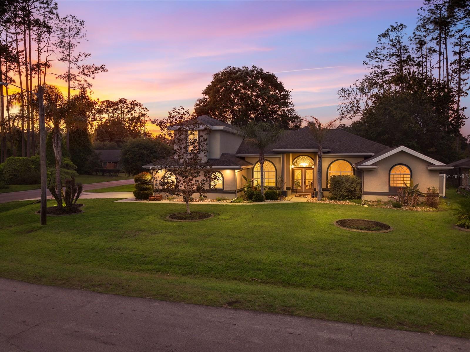 New Price! Now Offered at $529,000! Stunning custom-built pool home located in the desirable E-section of the Cypress Knoll neighborhood in Palm Coast, a sought-after golf course area. This beautifully upgraded residence offers 4 bedrooms, 4 bathrooms, and a versatile den on an oversized corner lot, showcasing exceptional craftsmanship and thoughtful design throughout. Elegant architectural details abound, including double tray ceilings in the master bedroom, dining room, and den, adding depth and sophistication to the home’s most prominent living spaces. The chef’s kitchen features maple cabinetry, stainless steel appliances including a gas cooktop with full exhaust hood, built-in oven and microwave, granite countertops, under-cabinet lighting, and a spacious island. The breakfast nook boasts mitered windows overlooking the pool, while the sunken family room, complete with a gas fireplace and built-in shelving, creates a warm and inviting living space.The luxurious owner’s suite includes a private sitting area, and the spa-like bath offers a walk-in shower, whirlpool tub, and dual vanities. A private second-level guest suite adds flexibility, along with a convenient pool bath accessible from the lanai. Extensive upgrades include a whole-house generator, dual HVAC systems with 3-zone control, roof replaced in 2019 with wind mitigation certified, updated gas hot water heater, pool equipment, and garage system, enhanced drainage and irrigation, and beautifully landscaped grounds with stonework and pavers. Additional highlights include central sound and intercom, plantation shutters, retractable screens on the double front entry doors for added comfort and airflow, an outdoor wet bar with wine cooler, and a gated garden area, perfect for enjoying Florida living. Ideally situated within minutes of the Cypress Knoll Golf Course, this home enjoys a prime Northeast Florida location just approximately 40 minutes from historic St. Augustine, known as the nation’s oldest city, and Daytona Beach, famous for its world-renowned racing events, and about an hour to an hour and a half from Jacksonville and Orlando, home to major attractions including Walt Disney World, offering convenient access to beaches, shopping, and dining, truly an exceptional location.