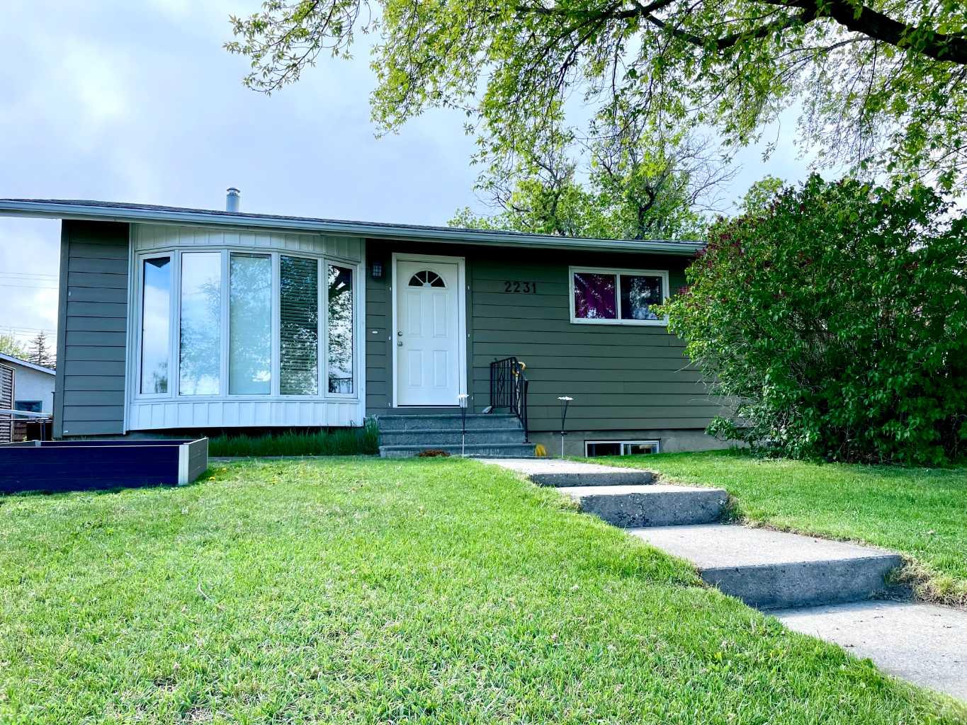 Welcome to a home that quietly overdelivers on value, versatility, and everyday ease—an exceptional opportunity for first-time buyers, savvy investors, or anyone looking to offset costs with a fully independent illegal basement suite.This inviting bungalow offers a well-balanced and highly functional layout, featuring three bedrooms on the main level and two additional bedrooms below, creating flexible living options for extended family, guests, or more. The home has been thoughtfully refreshed and well cared for over time, presenting clean, modern finishes and a move-in-ready feel that simply invites you to imagine life here.Set on a generous, fully fenced lot exceeding 6,000 sq. ft., the outdoor space is as appealing as the interior—perfect for entertaining, kids and pets, gardening, or simply enjoying your own private retreat. Ample parking adds to the home’s everyday practicality.Location is where this property truly shines. Nestled in one of Calgary’s most connected and amenity-rich communities, you’re minutes from schools, transit with easy downtown and LRT access, shopping, services, parks, recreation facilities, the local pool, and library. Everything that supports a convenient, family-focused lifestyle is right at your fingertips.Homes that combine space, flexibility, income potential, and location at this price point are becoming increasingly rare. This is one of those properties that makes people pause—and then rush to see it in person.Move-in ready. Full of possibility. Easy to fall for. Call your favorite agent today.