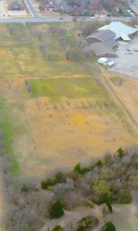 The front approximately 1.2 aces is zoned C3 for commercial and behind that has been approved for 15 duplex lots. Seller and Realtor are family.