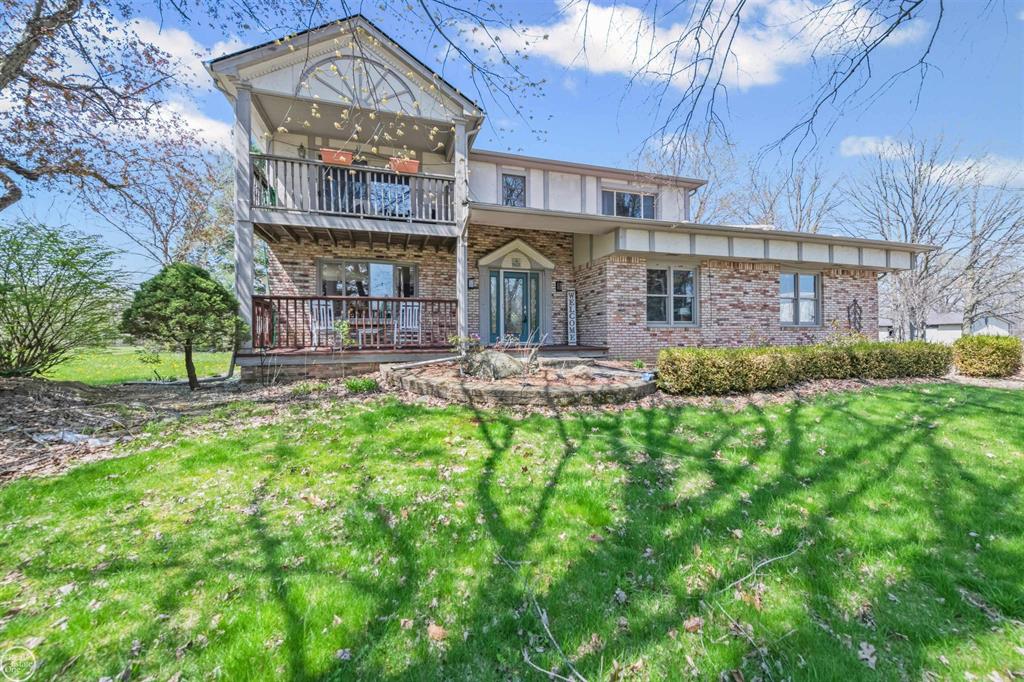 Set on nearly 15 private acres, this beautifully updated 3,400 sq. ft. Colonial offers the perfect blend of timeless charm and modern convenience. Featuring 4 bedrooms and 3.5 baths, the home welcomes you with a formal dining room and a spacious family room-each highlighted by its own fireplace. Designed with today's lifestyle in mind, the layout includes two dedicated home offices, ideal for remote work or flexible living. The expansive kitchen is a true centerpiece, showcasing granite countertops, premium Sub-Zero appliances, and a sun-filled breakfast nook with picturesque views of the property. Step outside to a private deck-perfect for relaxing or entertaining while taking in the peaceful, country setting. Additional amenities include an attached 2-car garage, a detached 3-car garage, and thoughtfully designed outdoor features such as a charming chicken coop, newer barn, fenced pasture ideal for hobby farming, and an 8-acre hay field. Enjoy the tranquility of country living with the convenience of being just 2 miles from M-53, all within the desirable Romeo School District.