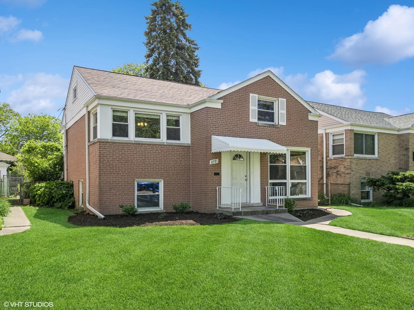 Stunning and spacious all-brick split-level home, nestled on a wide lot along a quiet, tree-lined street! The main floor features a sun-drenched living room with floor-to-ceiling windows, dining room, and a gourmet chef's kitchen complete with 42" custom cabinetry, Quartz countertops, stainless steel appliances, stylish backsplash, and recessed lighting-overlooking the lush yard and custom deck.  Updated lower level offers built-in shelving and storage, a half bath, laundry area, and convenient exterior access to the backyard. Two generously sized bedrooms on the second floor along with remodeled full bath, and the entire top floor dedicated to the primary suite featuring a walk-in closet and extra storage space.  Newer complete tear off roof.  Spend summer evenings relaxing in the tranquil, verdant yard or entertaining on the deck. Garage. Fantastic location-walkable to multiple parks, with quick access to highways, trains, restaurants, retail, Northwestern, Evanston, and all that Skokie has to offer!