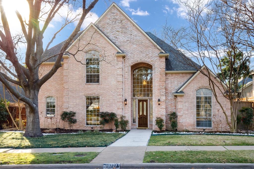 Located in the highly desirable and tree-lined neighborhood of Preston Park Estates, this stunning custom home offers timeless elegance, quality craftsmanship, and an exceptional floor plan designed for both everyday living and entertaining. Upon entry, you are welcomed by soaring ceilings and an abundance of natural light that fills the spacious formal living room, highlighted by a dramatic wall of windows overlooking the beautifully landscaped backyard. The formal dining room is conveniently located to the left of the entry & provides seamless access to the kitchen. The updated kitchen features crisp white cabinetry, granite countertops, and large windows positioned above the cooktop and sink that flood the space with natural light. The breakfast nook opens directly to the kitchen and expansive family room, creating a warm and inviting gathering space. The family room is generously sized and showcases a cozy fireplace with gas logs, large windows with backyard views, and direct access to the patio and outdoor entertaining area. The first-floor primary suite offers peaceful backyard views and a luxurious, fully remodeled ensuite bath featuring a large walk-in shower, new cabinetry, quartz countertops, updated faucets, modern lighting, and a spacious walk-in closet. The majority of the 1st level is enhanced by beautiful nail-down, sand-and-finish hardwood flooring. The second floor provides excellent flexibility with three spacious guest bedrooms, two full bathrooms, and a large game room perfect for recreation or relaxation. The private backyard is designed for entertaining with an open deck & lush landscaping that creates a serene outdoor retreat. Completing this impressive home is an oversized 3 car garage offering ample storage and workspace. Ideally located just minutes from Preston Road, George Bush Turnpike, shopping, dining, parks, & medical facilities, this meticulously maintained residence showcases high-quality finishes & pride of ownership throughout.