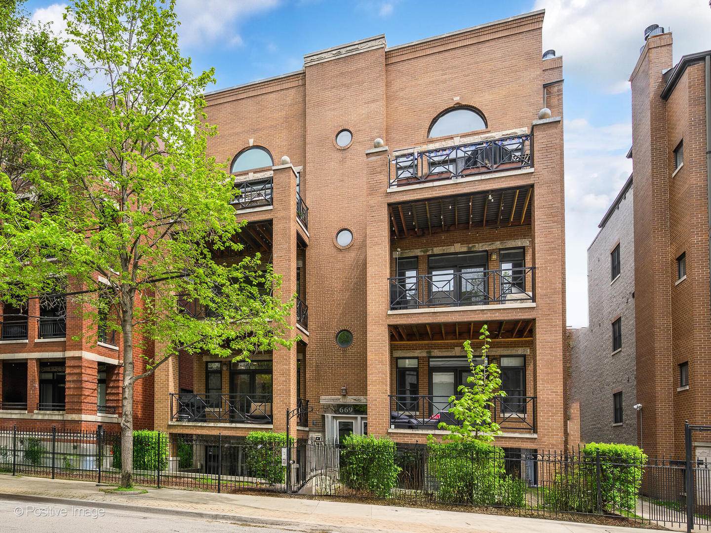 Welcome to your urban retreat situated in the coveted River West-Fulton Market neighborhoods. Close to transportation, fine dining and shopping, yet perfectly tucked away off the beaten path for your down time, this extra-wide & bright 2 bed 2 bath condo with 10 ft. ceilings checks all the boxes. Revel in the open layout of this boutique-sized property where EVERY UNIT IS A CORNER UNIT.  Experience true indoor-outdoor living with a front terrace off the extra-large living room, seamlessly extending your living space to the outdoor terrace overlooking a quiet tree-lined street; or stay inside to catch up on your shows on the large media space while in front of the cozy (wood burning/gas log) fireplace.   The entertainer's kitchen with ample granite counters/work space features all stainless-steel appliances, 42" Cherry cabinets and a sleek breakfast bar peninsula with ample space for high-top table style dining. This open concept kitchen lets you flex your culinary muscles while staying engaged with your guests.   The main hall hides the large hall closet, in-unit laundry and mechanicals out of sight and also provides a bit of extra flex space currently used as a mixology-bar placed out of sight. Both bedrooms are set in the rear of the unit for privacy. The large hall bedroom provides lots of space for a split office/guest bed setup, & tons of closet space too.   The gigantic primary suite is placed at the rear of the unit on a corner overlooking the side and rear courtyards. This primary suite has the space for you to manifest your dreams, and also has a large walk-in closet to top it off.  The primary bath is complete with an enormous dual vanity granite counter and equally massive mirror with fantastic lighting.  The spa-like primary bath is further enhanced by a large Jacuzzi style tub and separate glass shower enclosure from which you can either soak, steam or shower away the cares of the day before settling into down time at HOME.  At the rear of the main hall, you can further enjoy the convenience of private garage parking right outside your rear door out onto the newer rear stairs (2021) to the large gated rear courtyard and private lower-level storage closet area. This raised first floor unit sits within a solid boutique sized building which is a hidden gem, that won't be here for long.  No current or planned Special Assessments. Roughly 15k in reserves.  WALK-THRU VIDEO AVAILABLE UPON REQUEST.  Contact Michael.