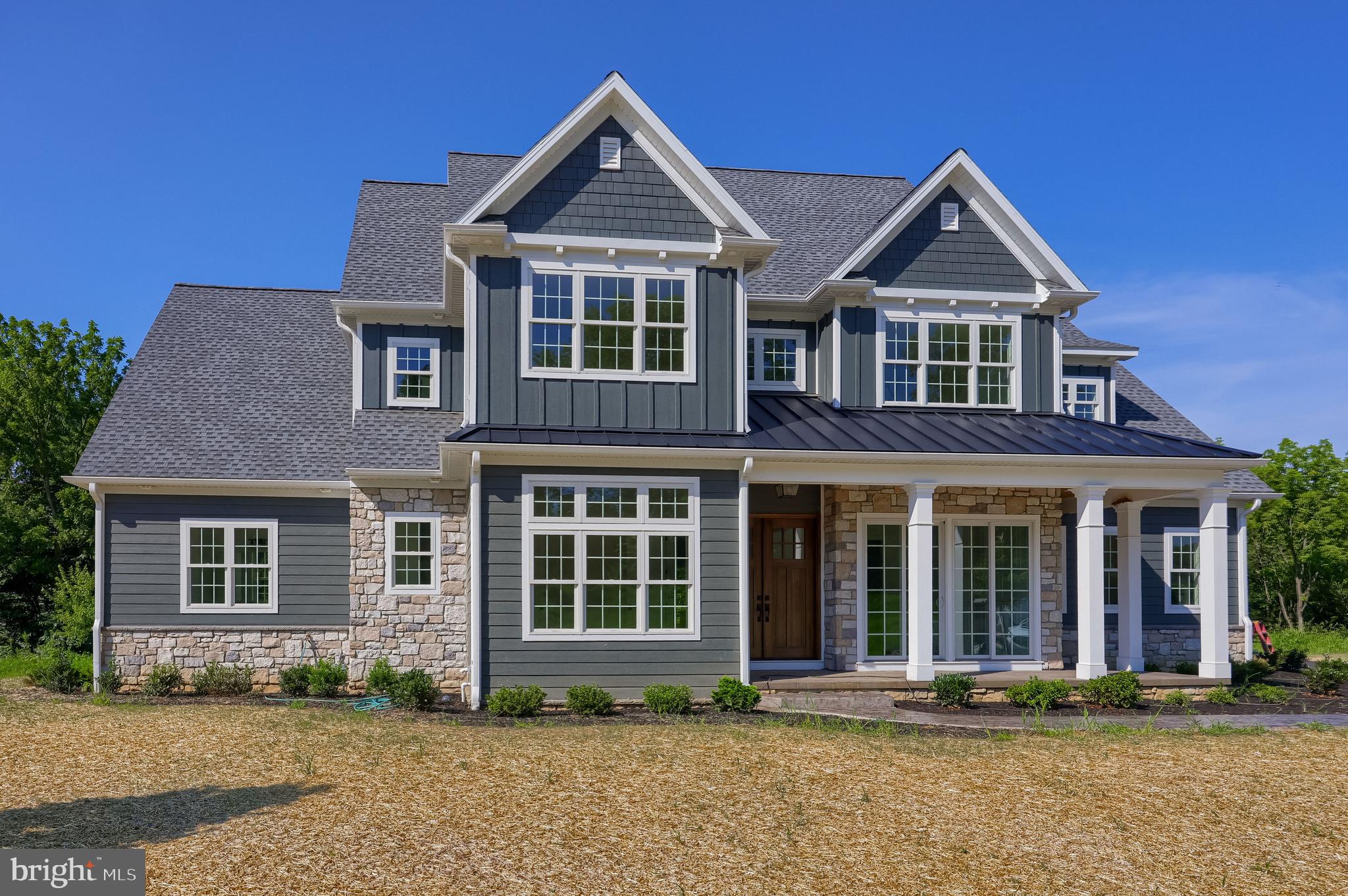 Custom similar home by Greystone Construction to be built in Manheim Township School District.  Spacious family room with fireplace open to gourmet kitchen with large island. Primary bedroom on main level, study that could be used as a 2nd main level bedroom if needed, open floor plan with detailed tile work, moldings & trim throughout, 14 foot ceilings on main level, built-ins, sunroom, covered porch with fireplace adjacent patio, upstairs has 3 additional bedrooms and a loft area.