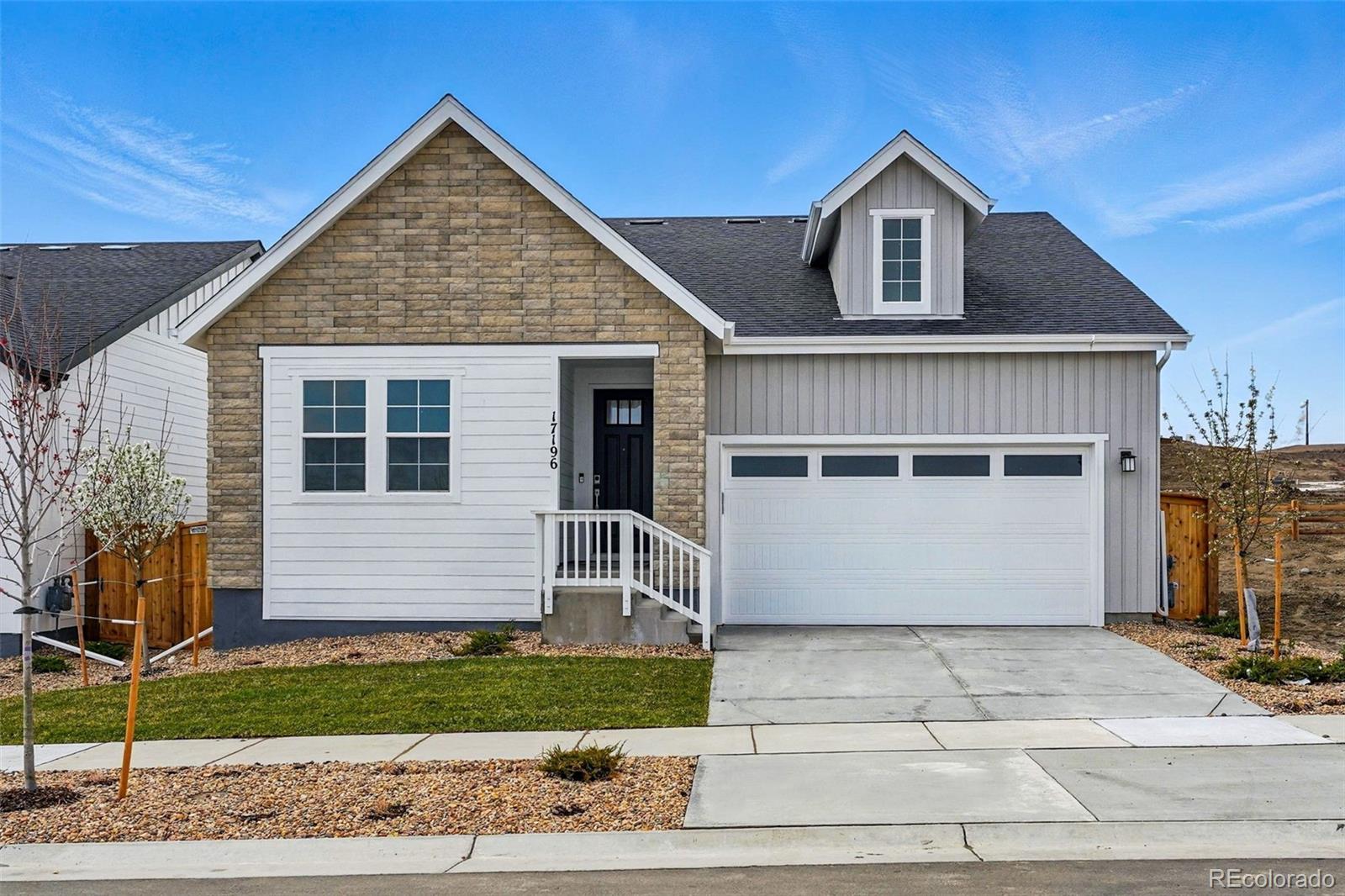 MLS#7999975 New Construction - Ready Now! Welcome to the Royal Arch at Trailstone, this home sits on a lot that backs to the greenbelt ! As you step inside this inviting home, you'll find a cozy secondary bedroom, full bathroom, and flex space at the front, along with another spacious flex space off to the left. Continuing down the foyer, you'll discover an open-concept gathering room, dining room, and well-appointed kitchen, all overlooking the covered patio. The generous primary suite features an en-suite bathroom and a walk-in closet. Additionally, there’s an unfinished basement for extra storage space. Photos are virtually staged and for representative purposes only. Structural options added include; Gourmet kitchen, sink in laundry, 8' doors on main level, 9' unfinished basement slab floor, plumbing rough-in at basement, and covered patio.